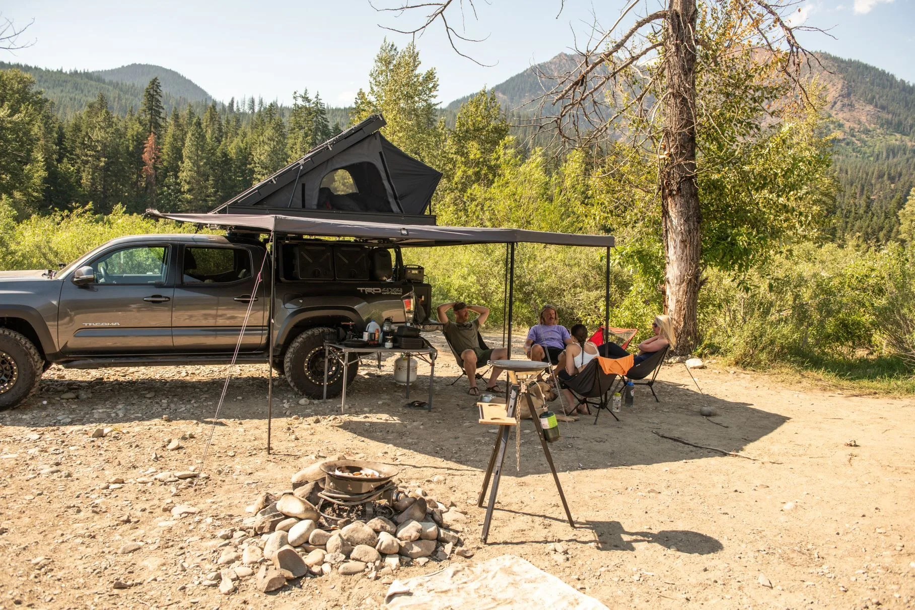 ikamper rooftop tent and awning at a camp site