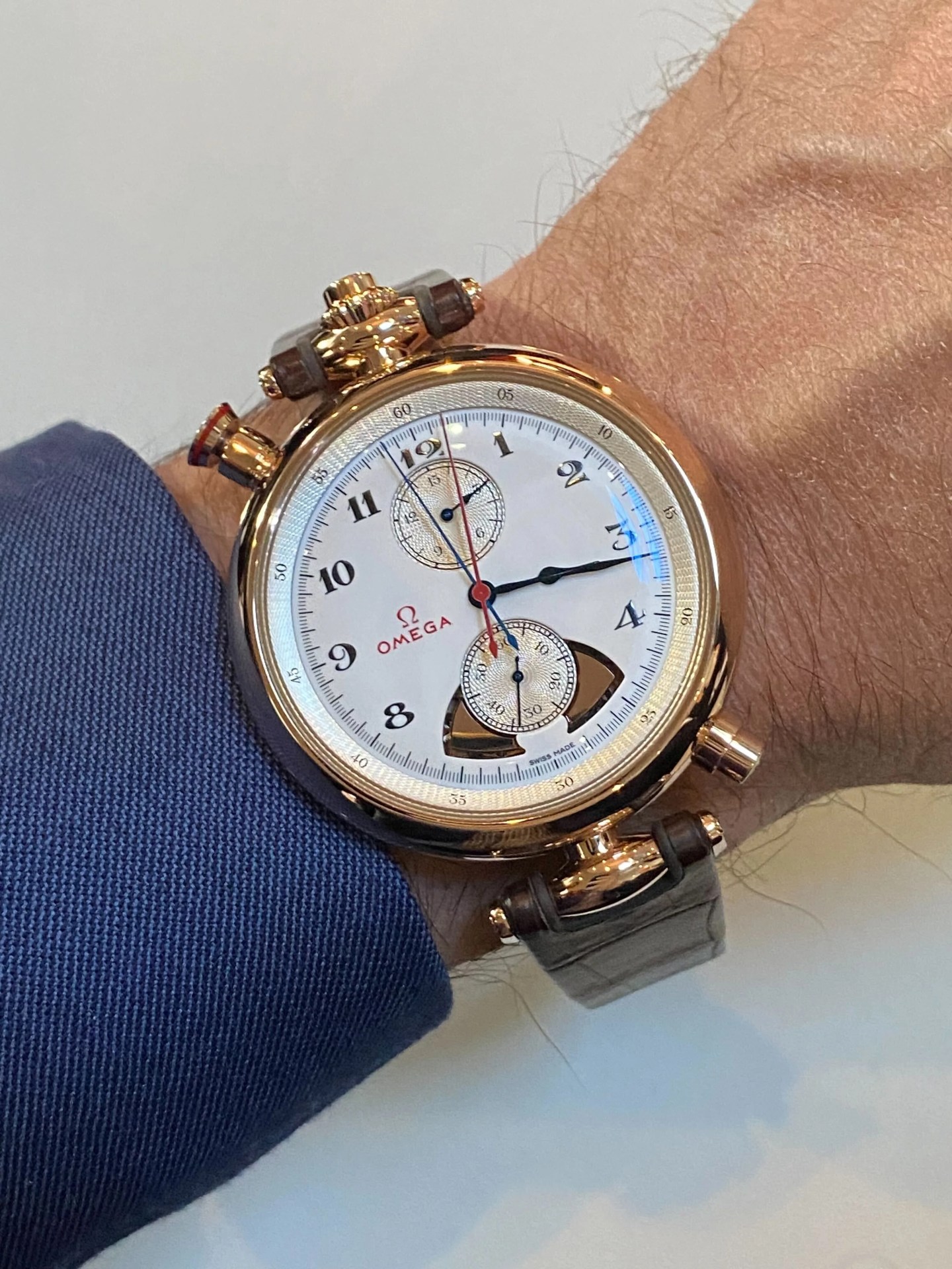 gold watch on wrist