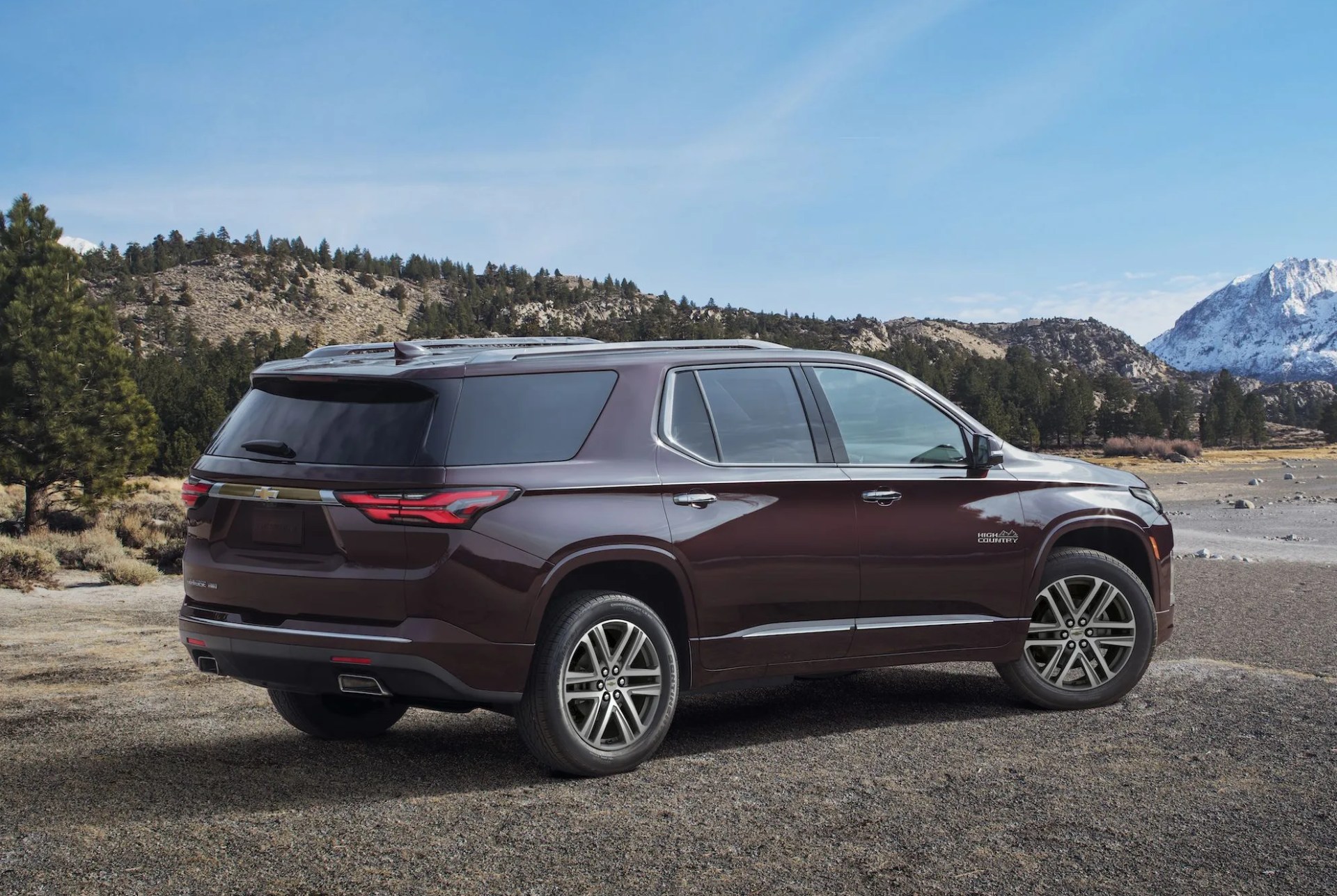 chevrolet traverse high country by a lake in the mountains