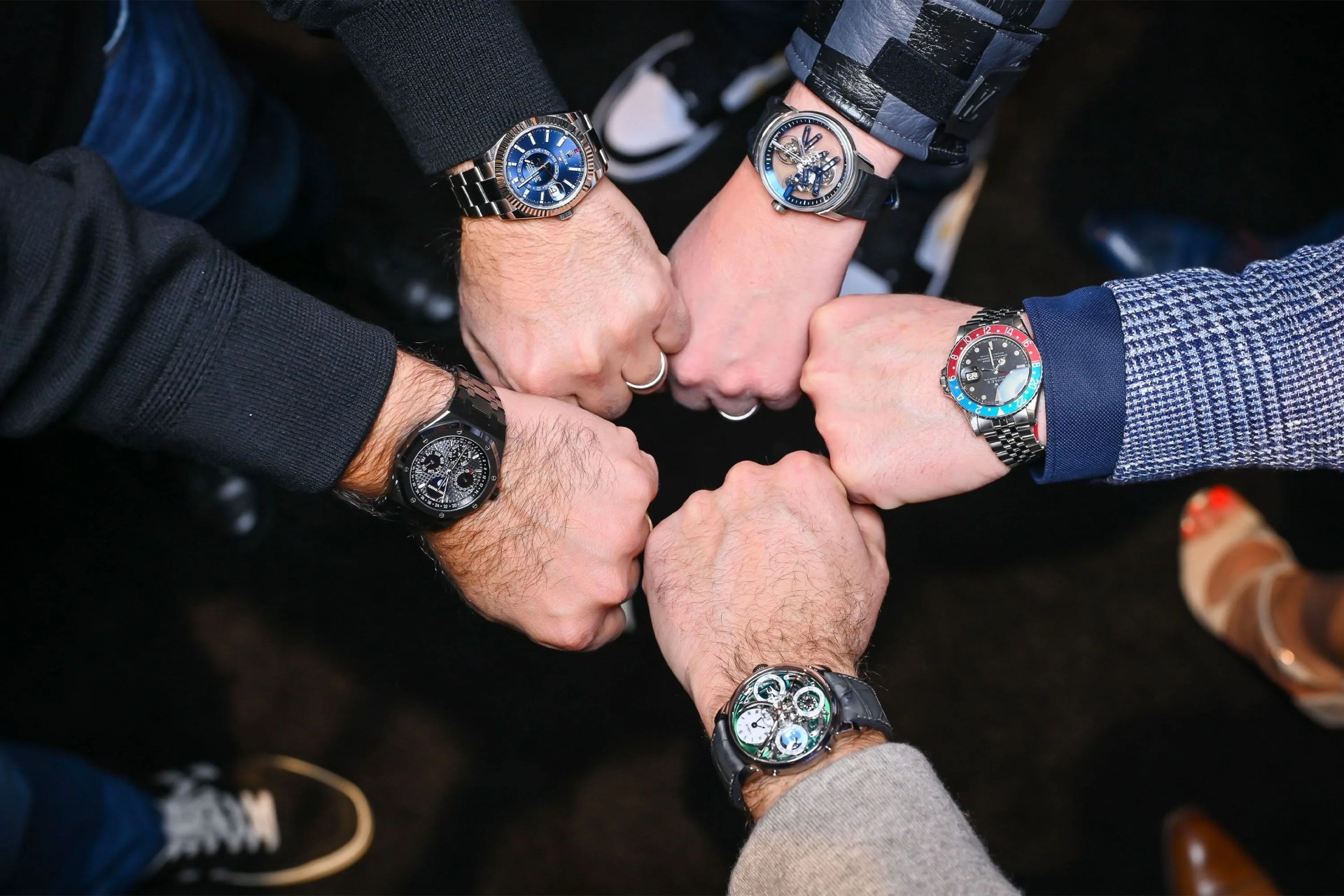 men at a watch show