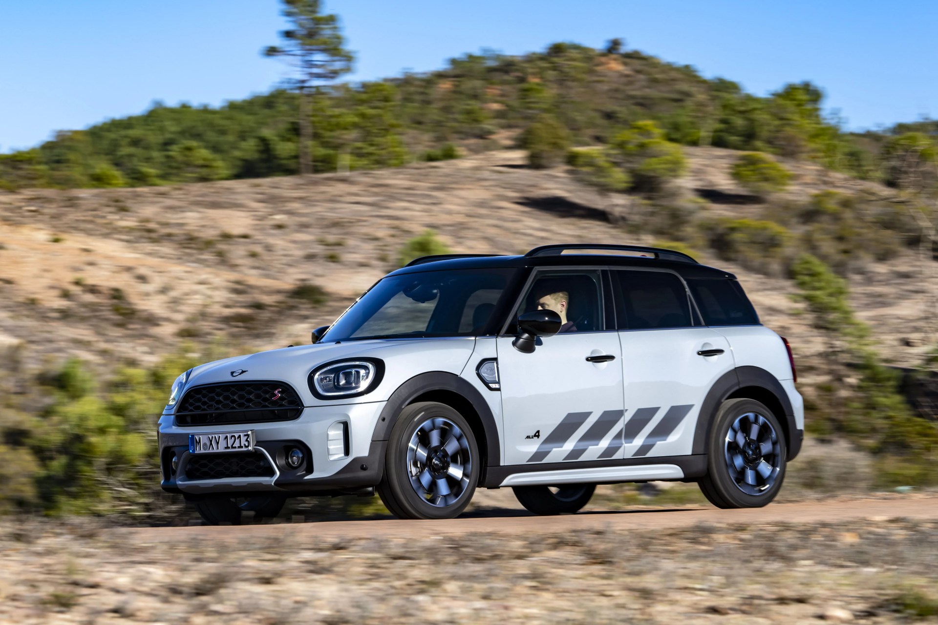 mini countryman driving on a mountain road