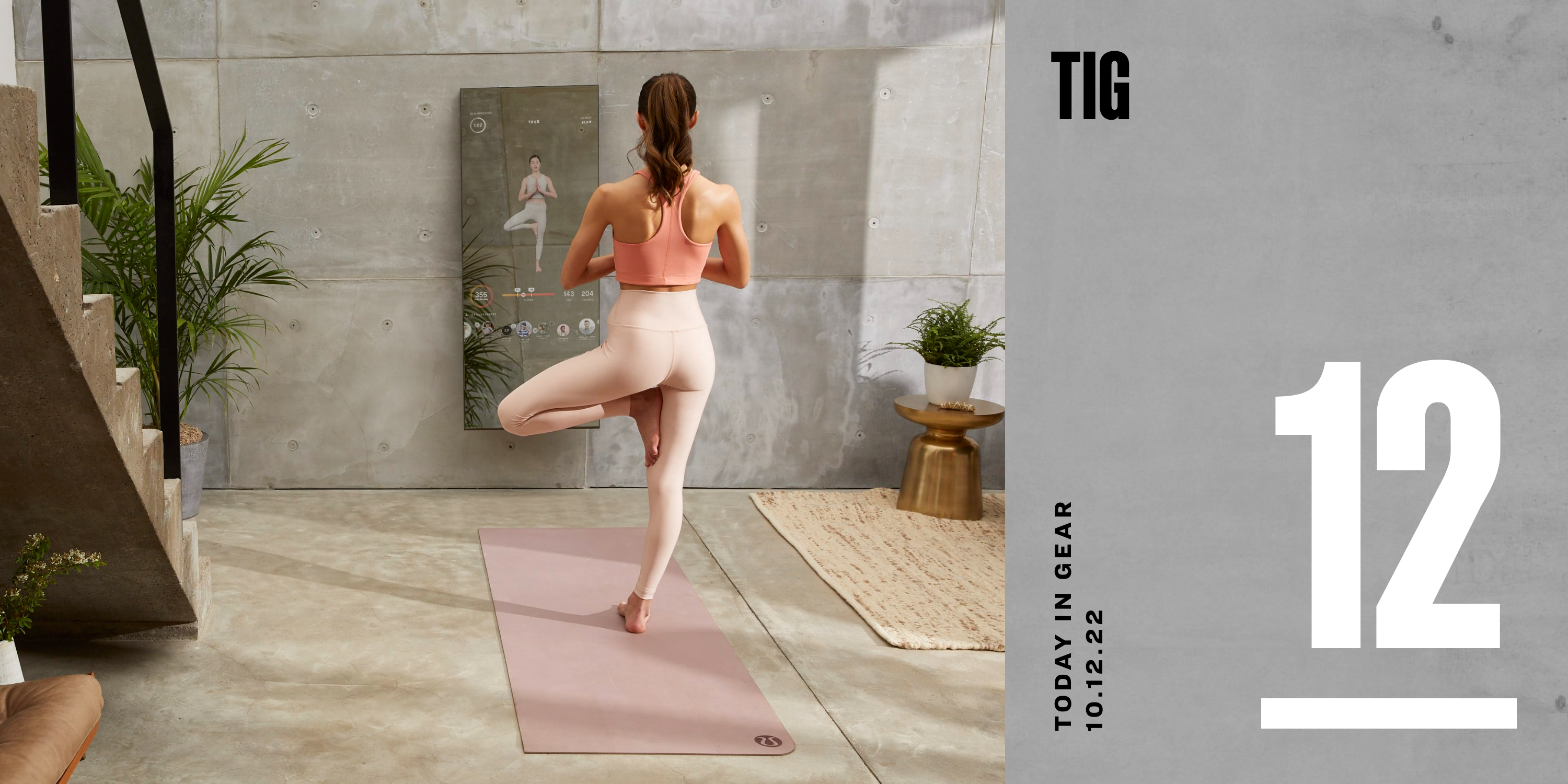 a woman doing yoga with a lulu mirror