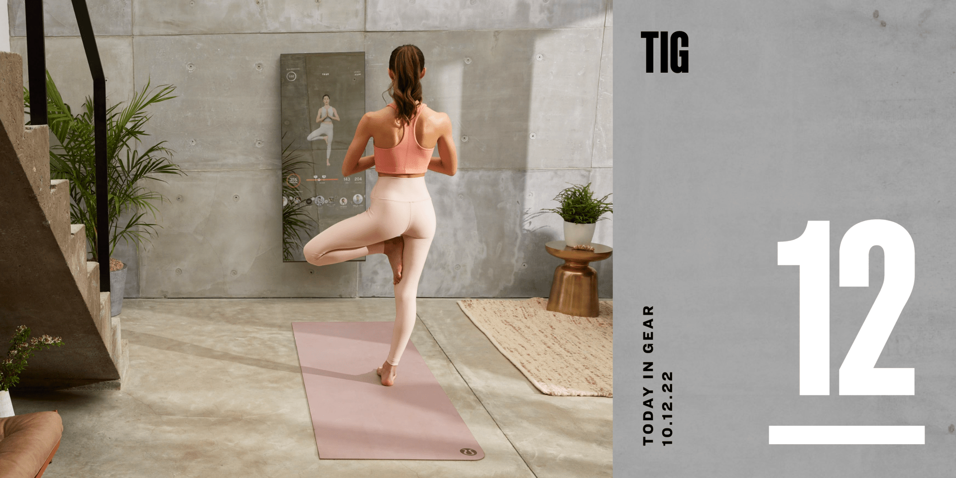 a woman doing yoga with a lulu mirror
