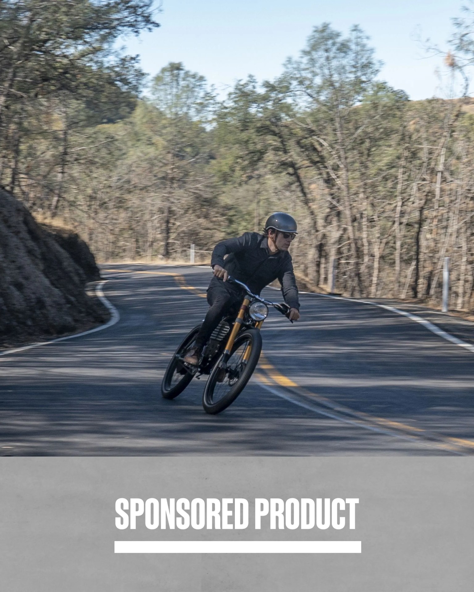sponsored product man riding vintage electric bikes 72 volt roadster down road