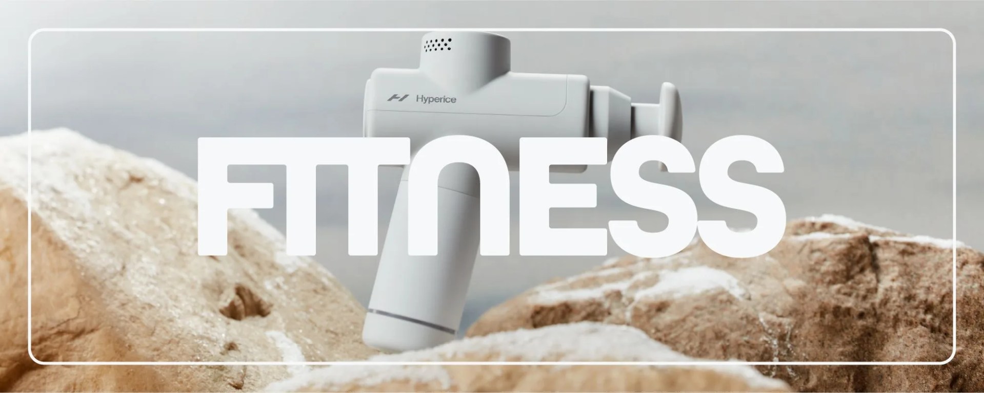 a massage gun on a snowy rock