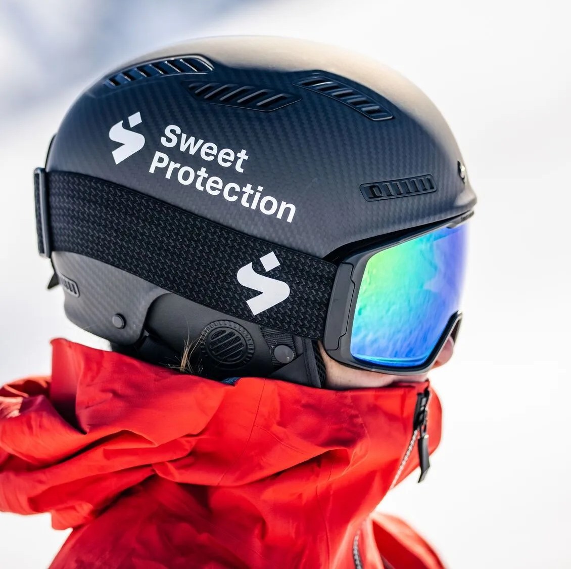 a person wearing a ski helmet with goggles