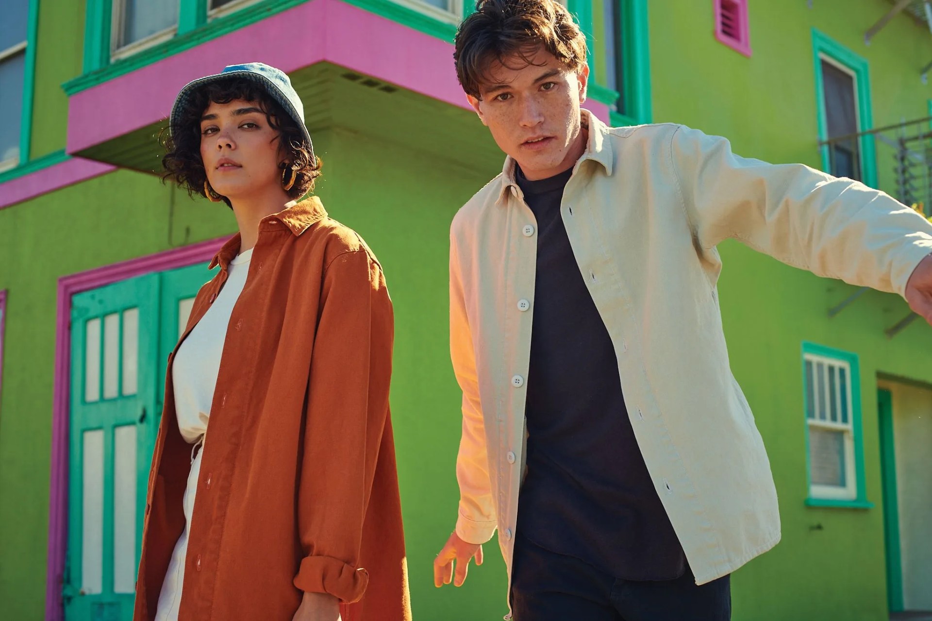 man and woman in jungmaven’s rugged, hemp canvas coach jacket