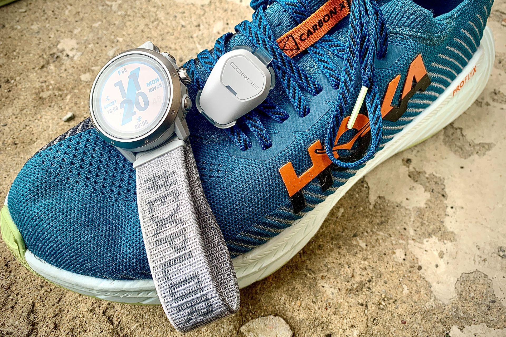 coros pod 2 and a coros watch on hoka shoes