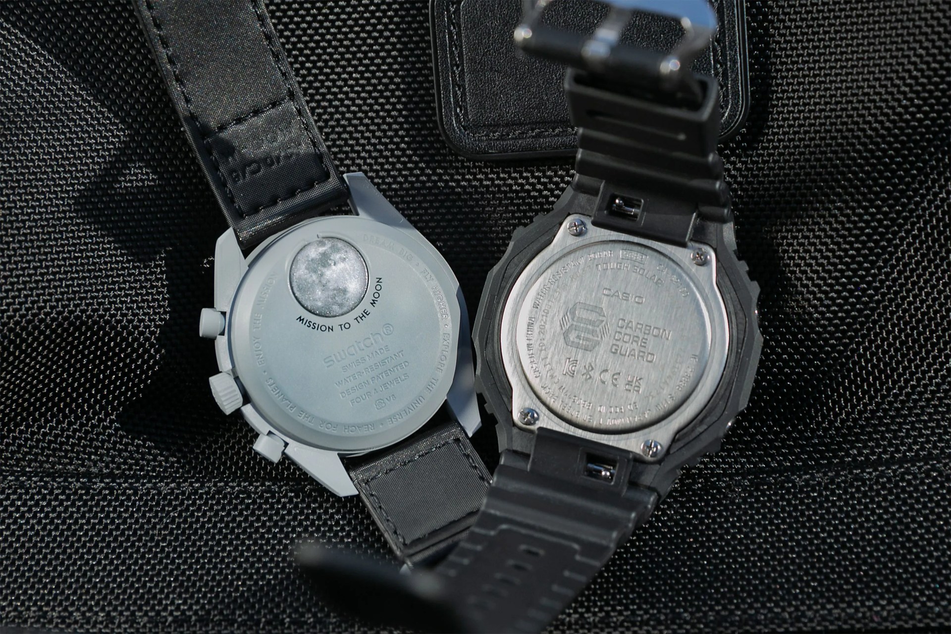backside of an omega and casio watch