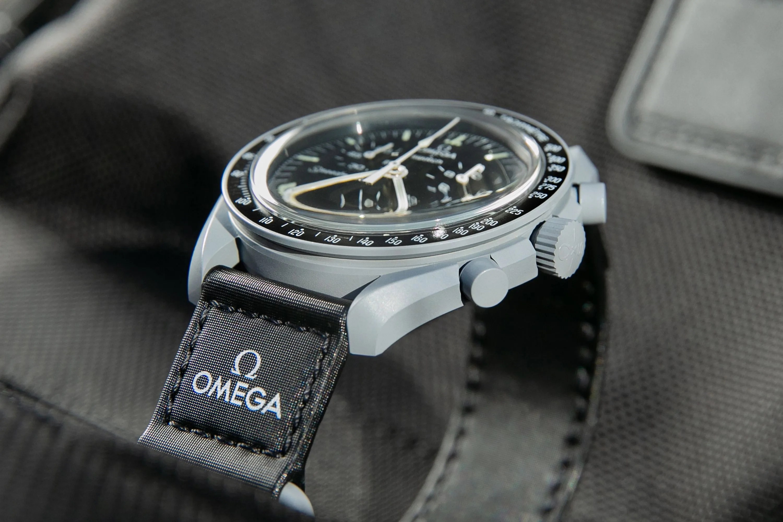 side of an omega moonswatch
