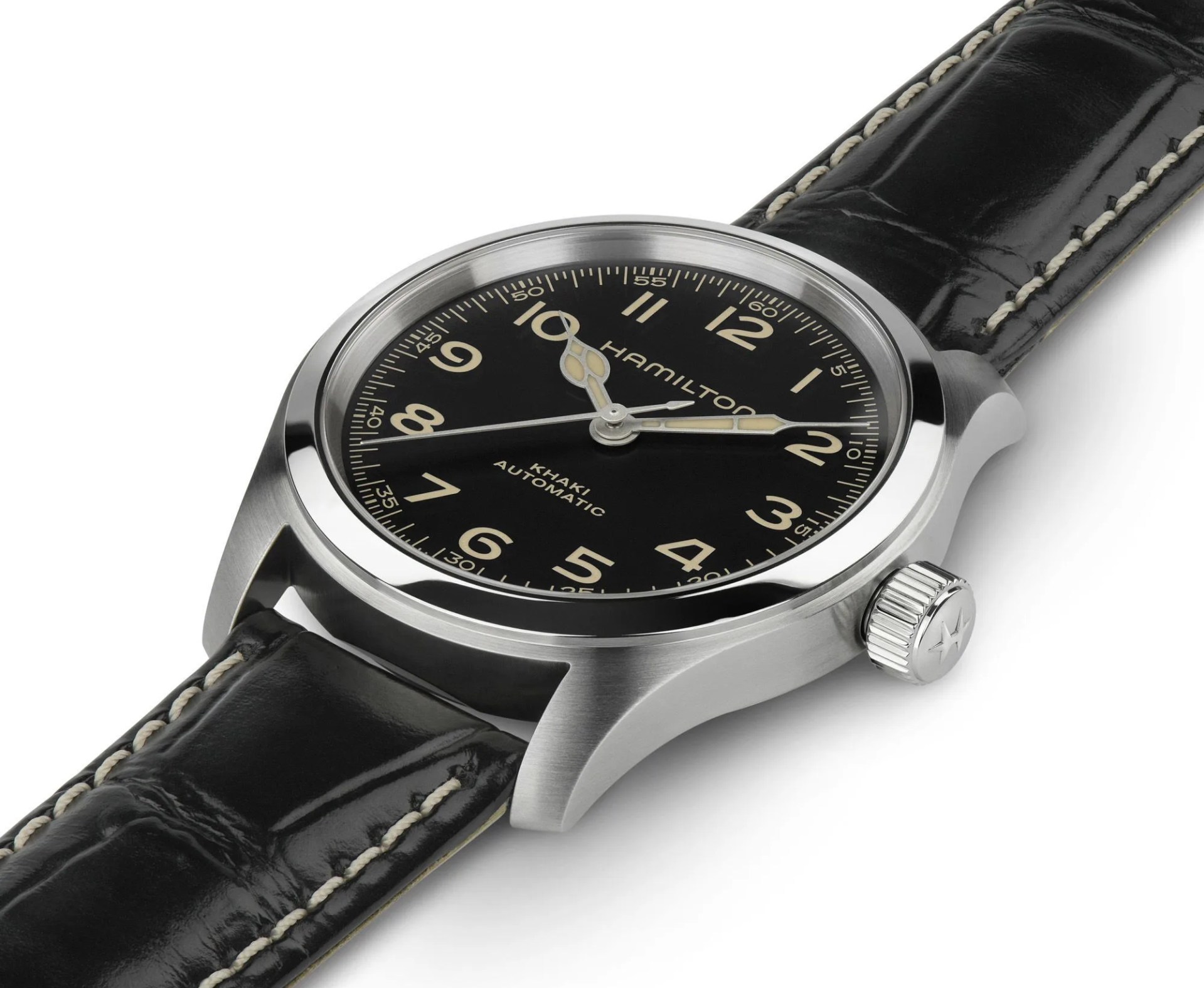 hamilton murph watch laid flat on white surface