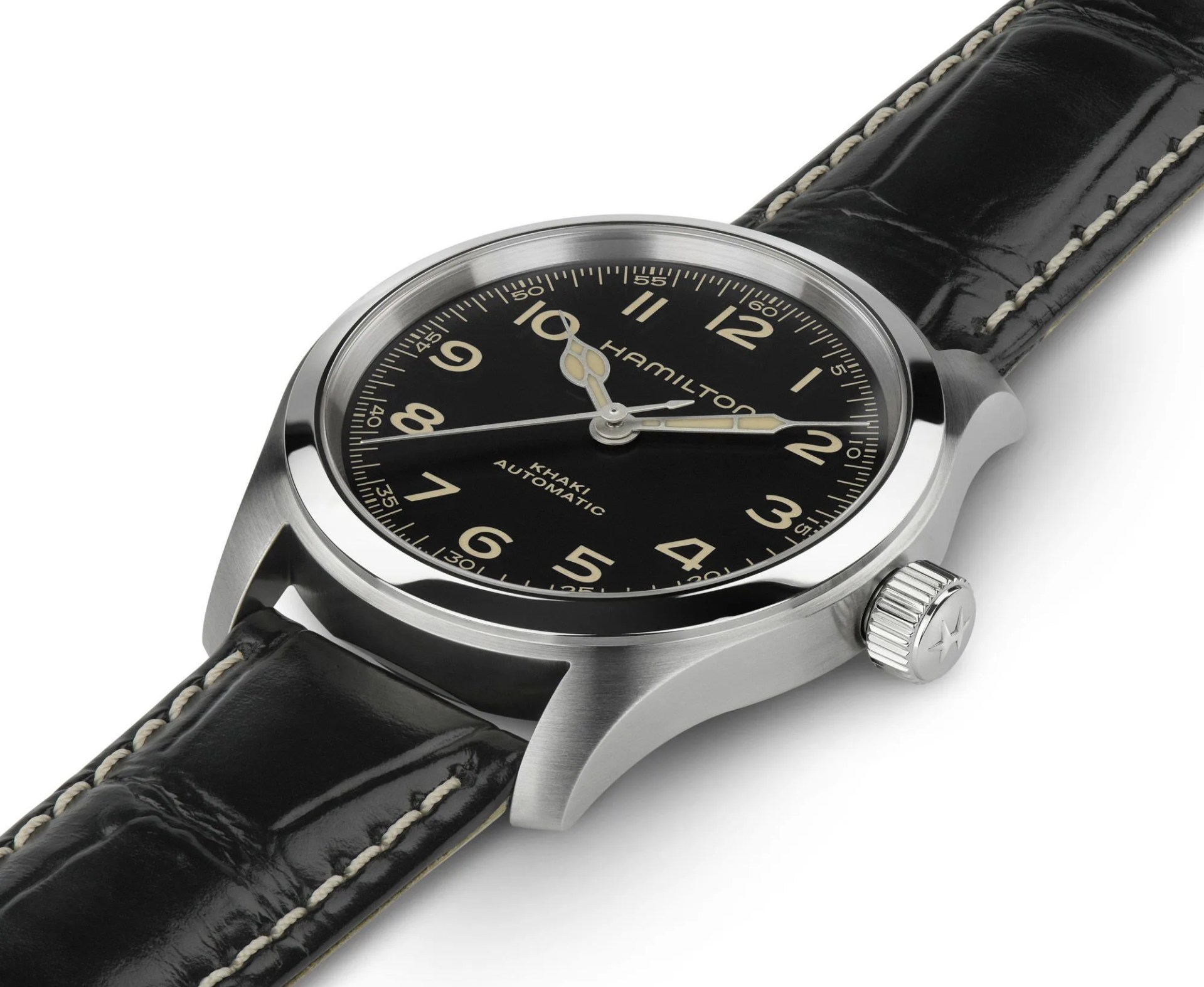hamilton murph watch laid flat on white surface