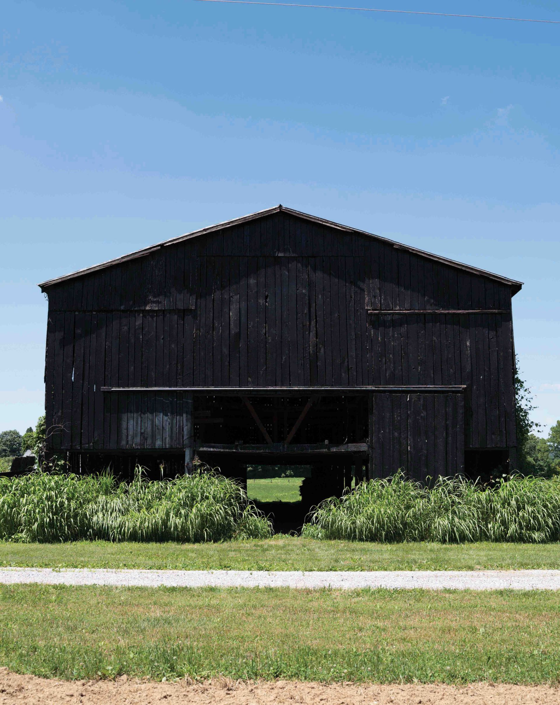 hidden barn painted all in black