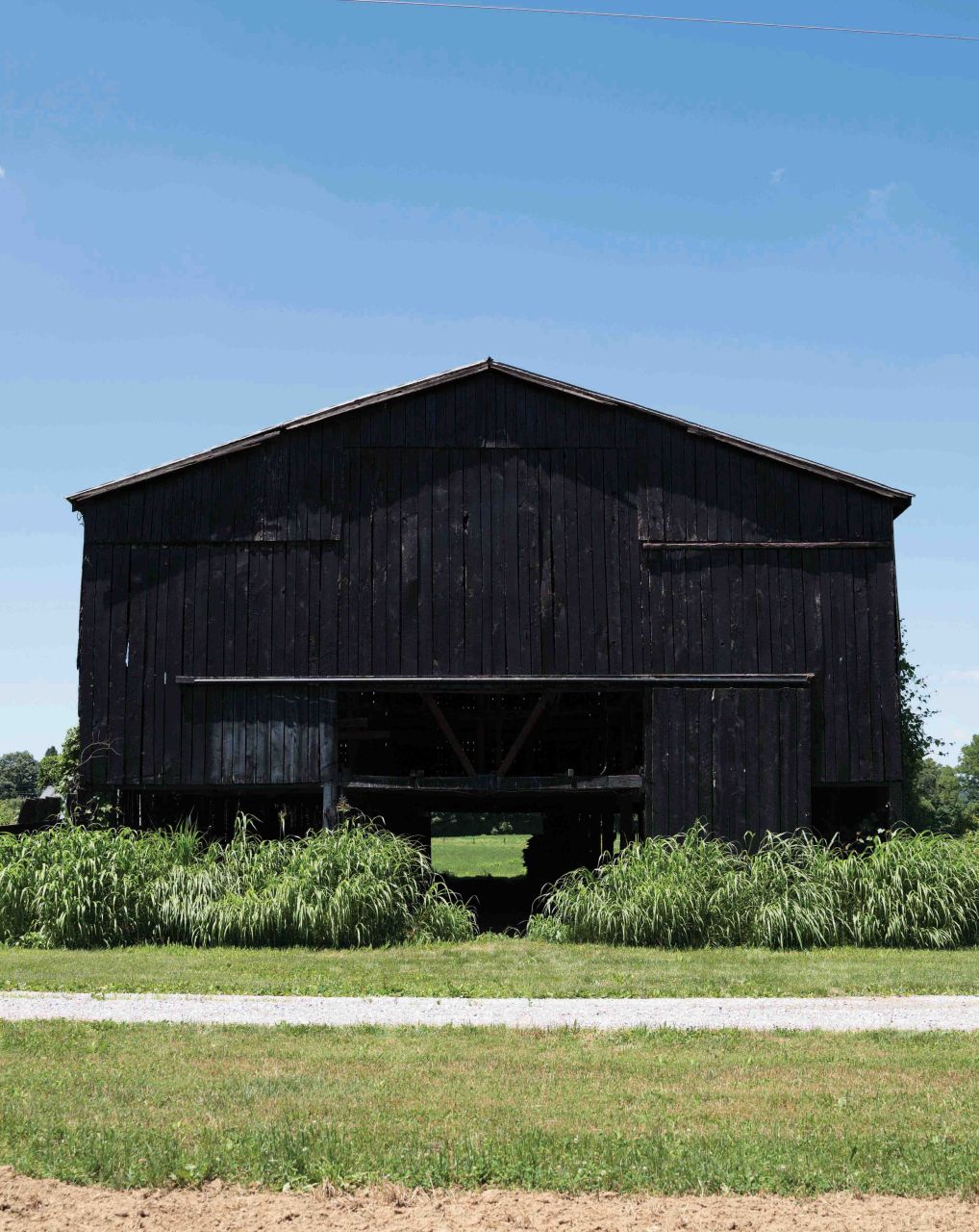 hidden barn painted all in black