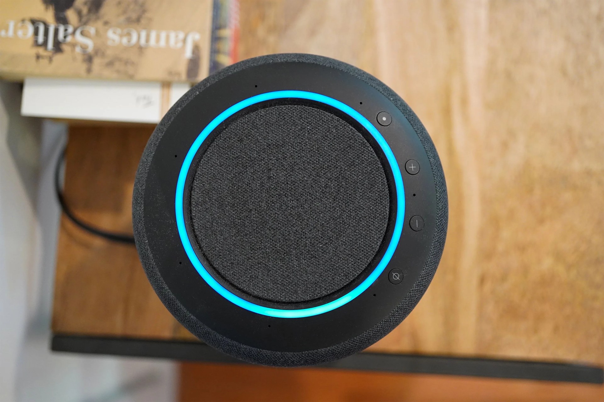 the top of an amazon speaker sitting on a side table
