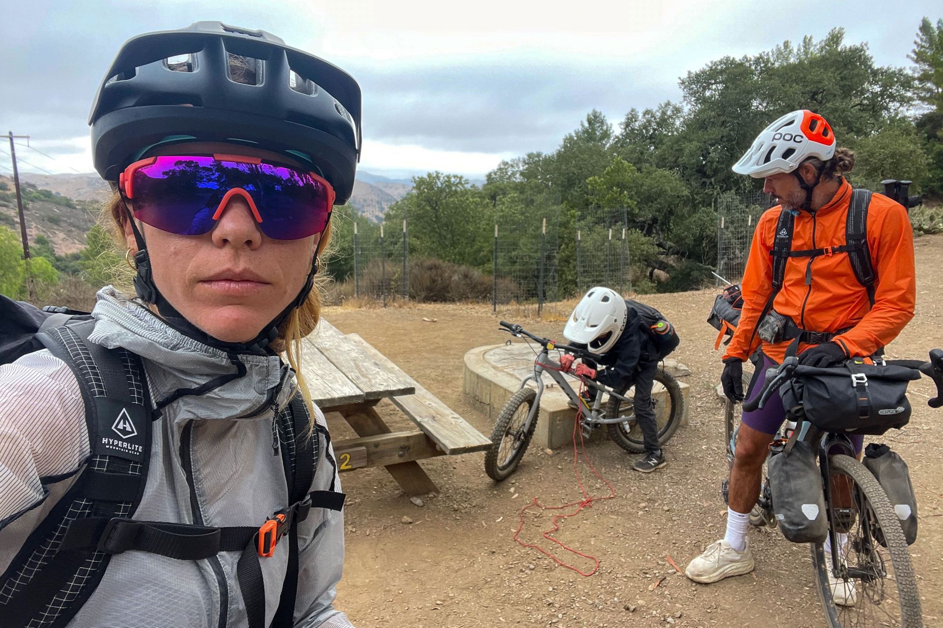 three people biking