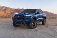 colorado zr2 desert boss parked in the desert with mountains in the background