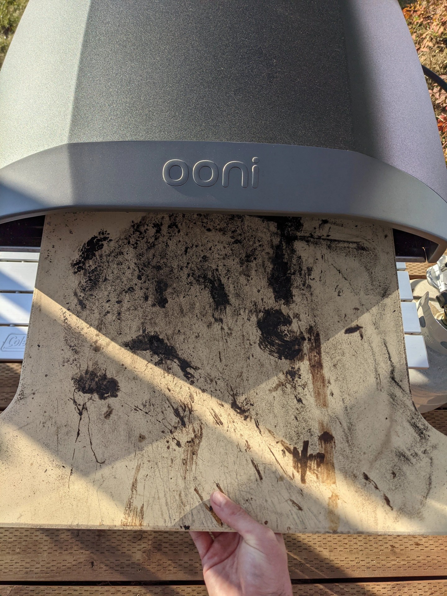 dirty stone in an ooni pizza oven