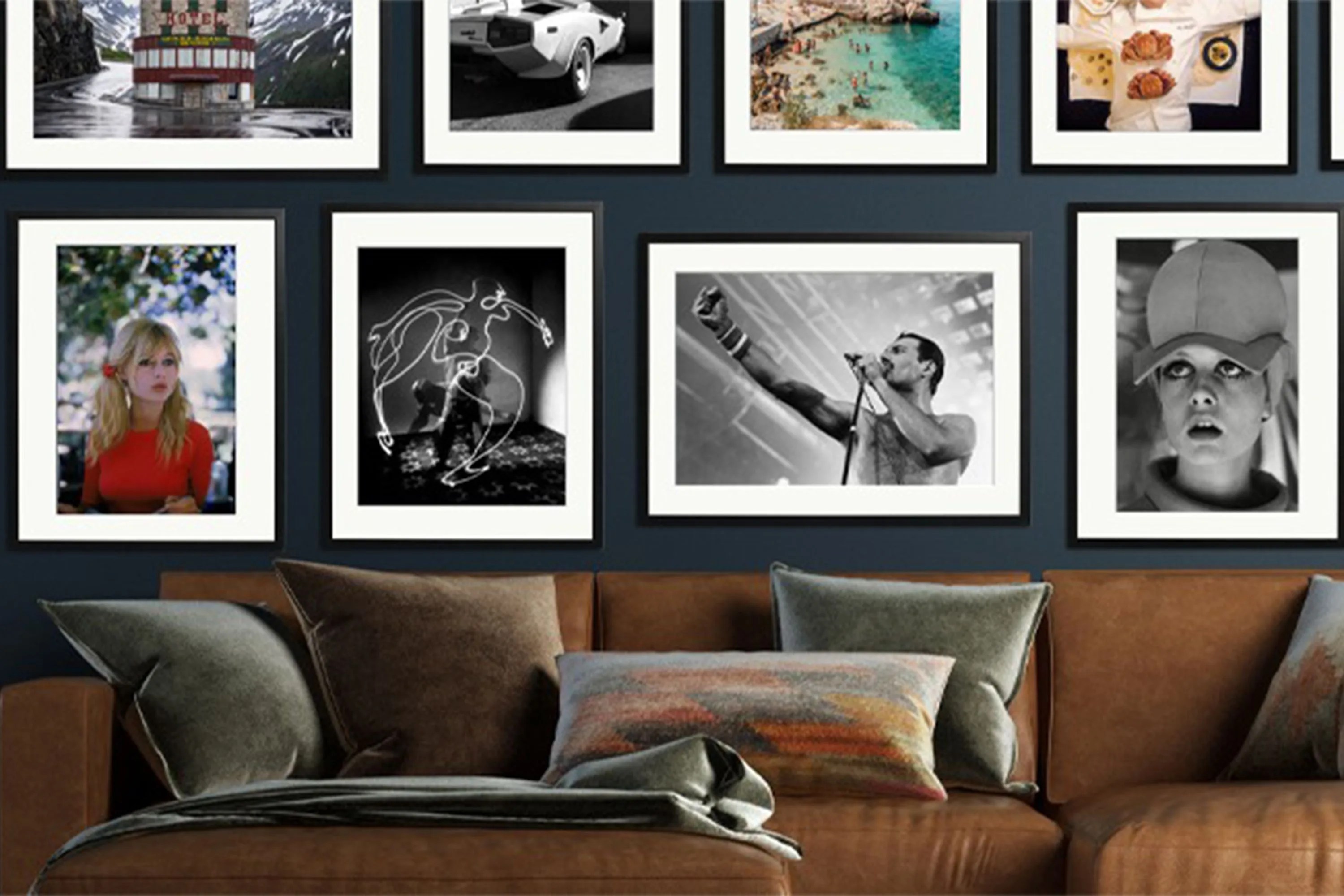 framed images above a couch