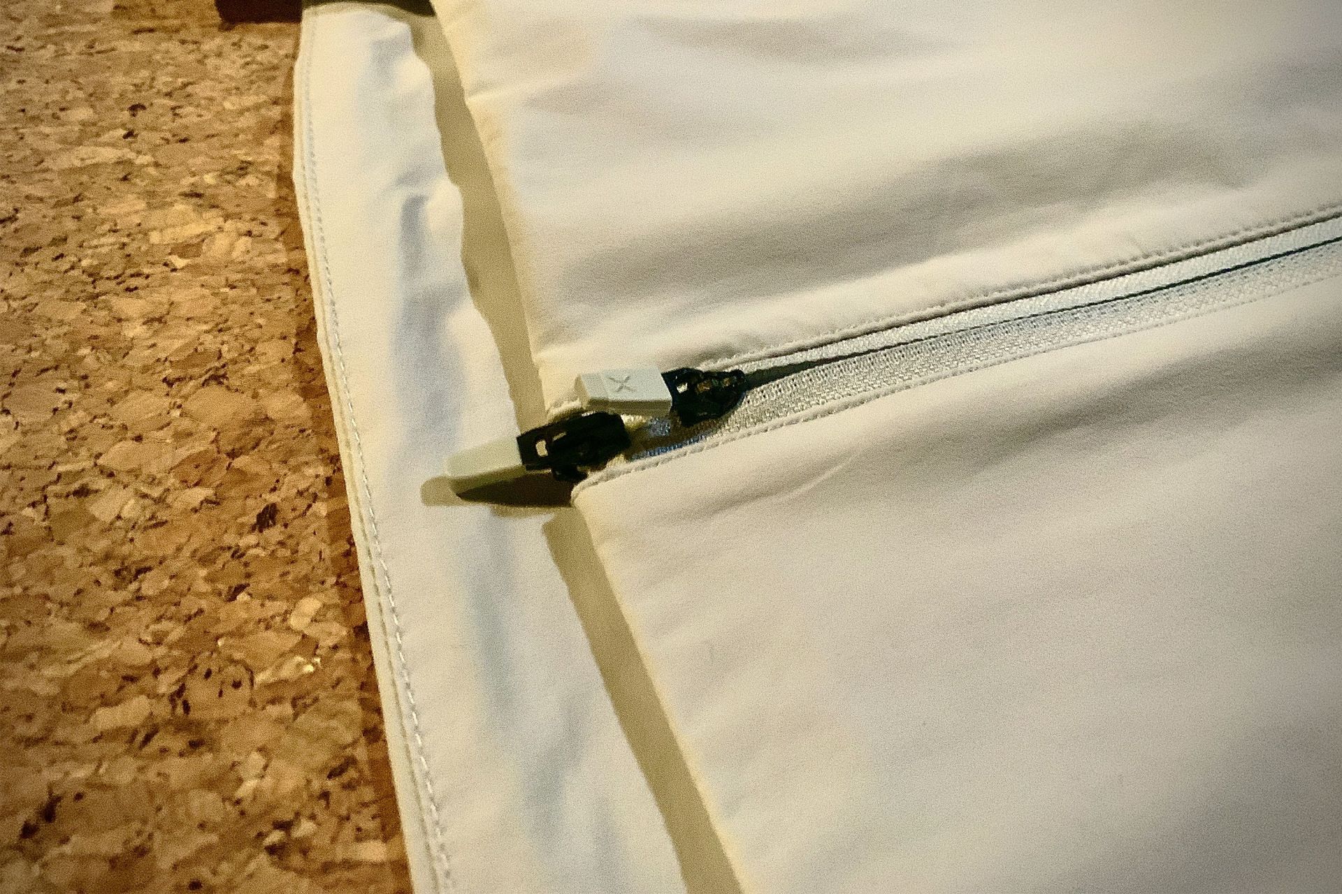 close up of a ten thousand lightweight jacket zipper