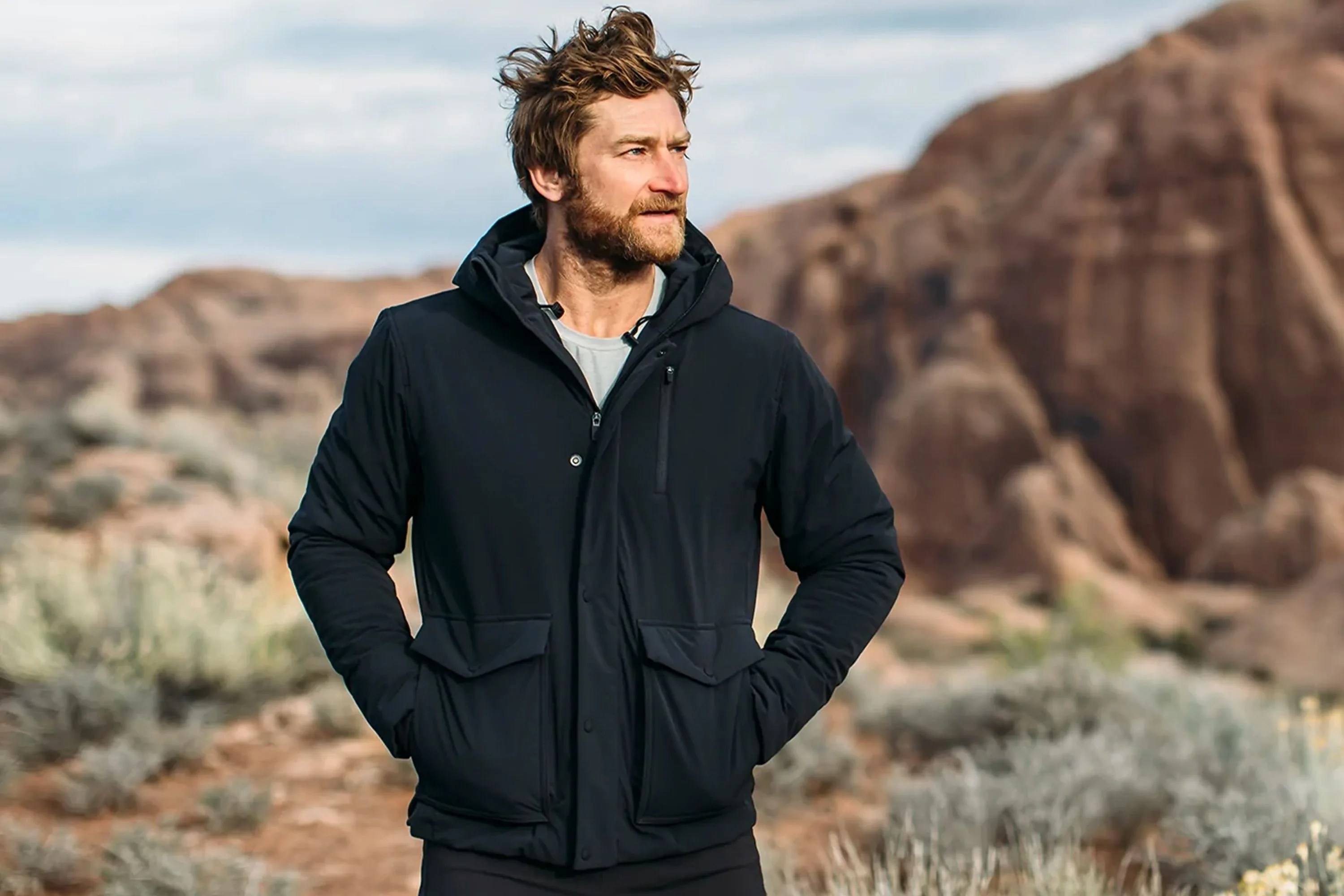 man wearing a black hooded jacket