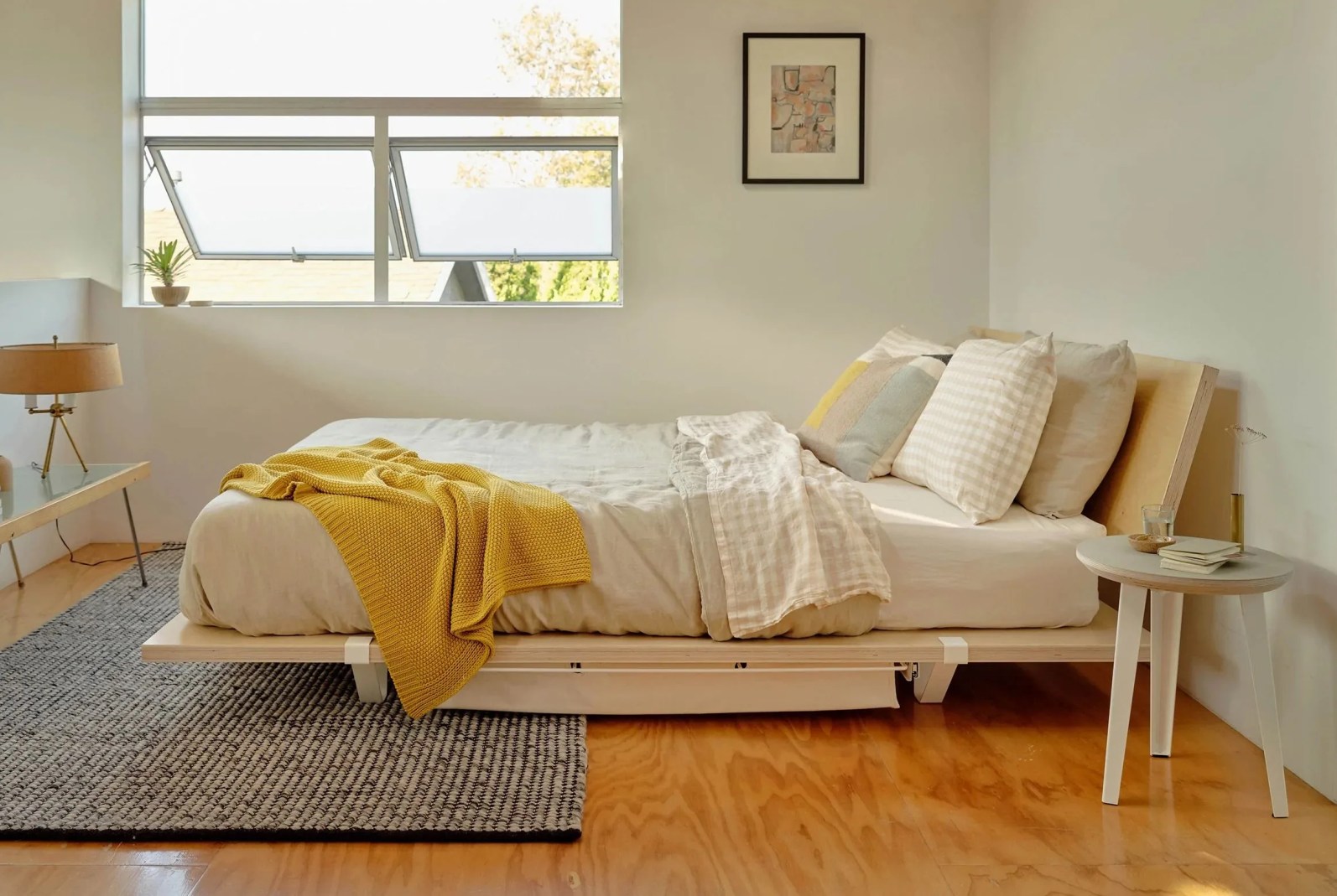 a floyd bed frame in a bedroom