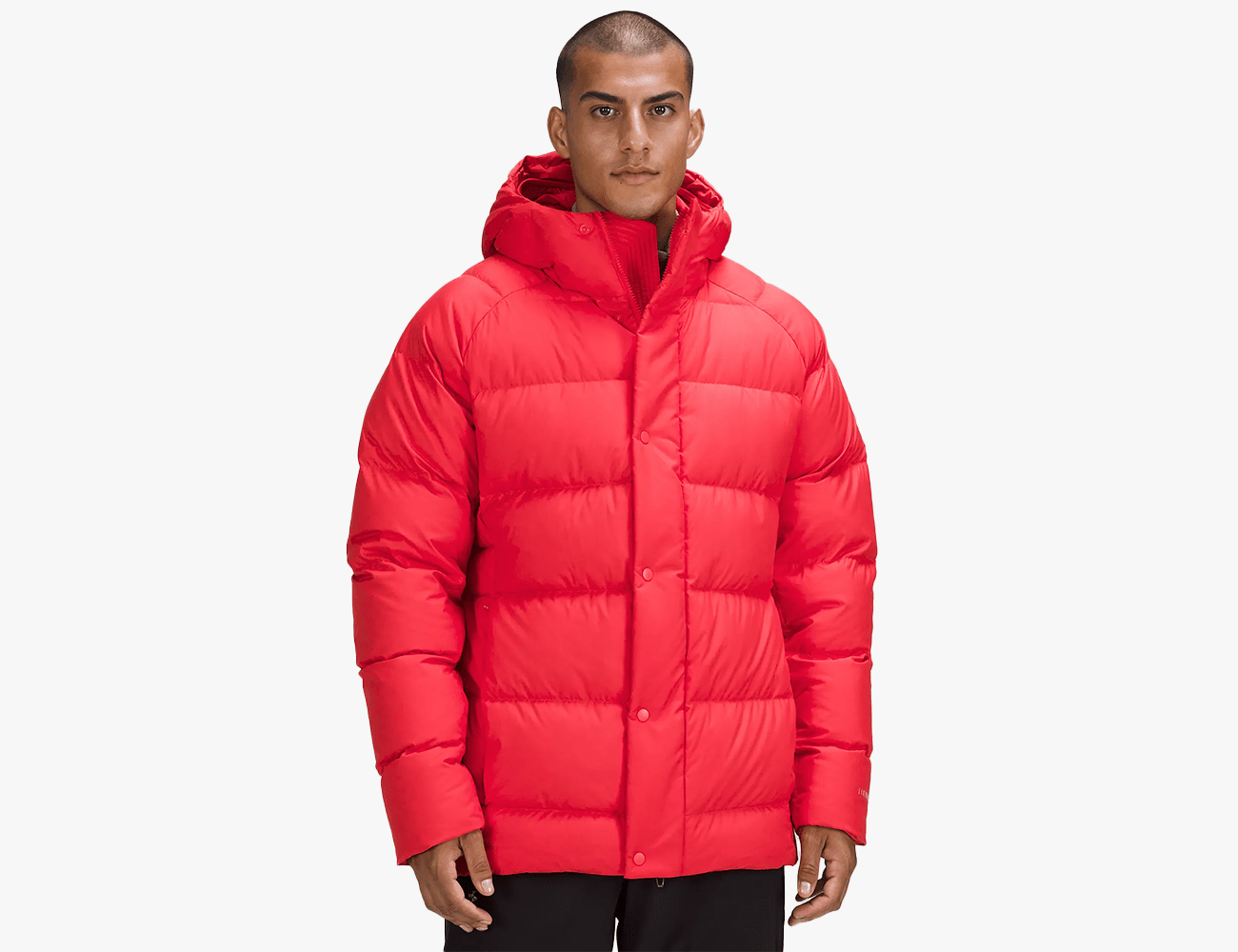 a person wearing a red lululemon wonder puff jacket