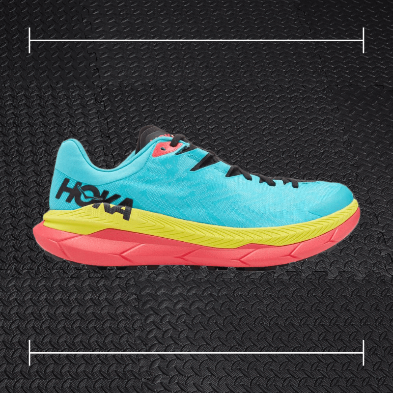 a blue yellow and pink hoka fitness shoe laid over top a photo of black rubber gym flooring