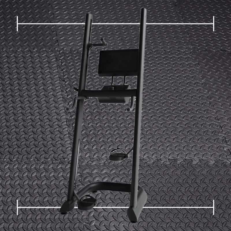 a black climbr machine laid over a photo of black rubber gym flooring