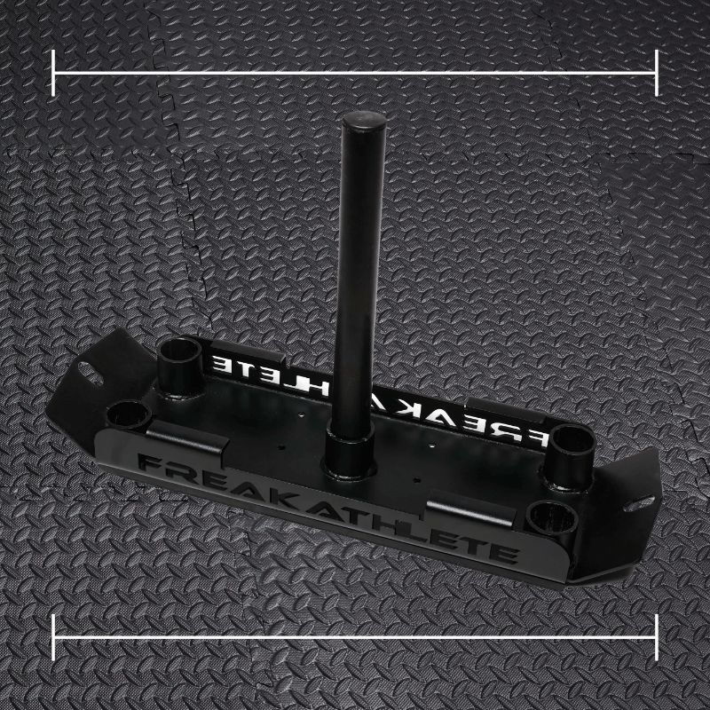 a sled laid over top a black rubber gym flooring
