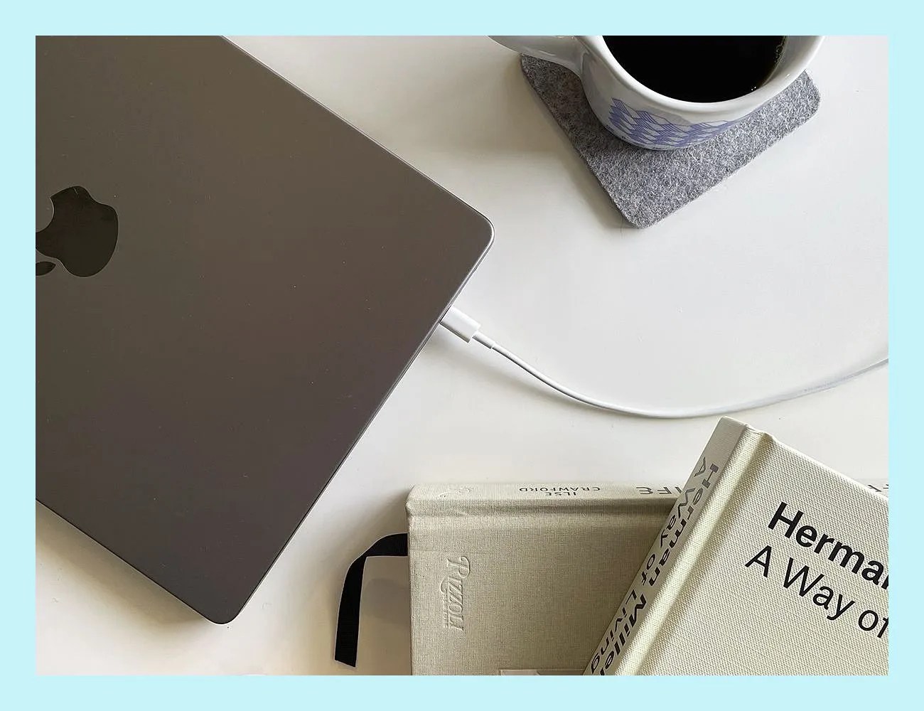 macbook pro with 2 meter charging cable gear patrol