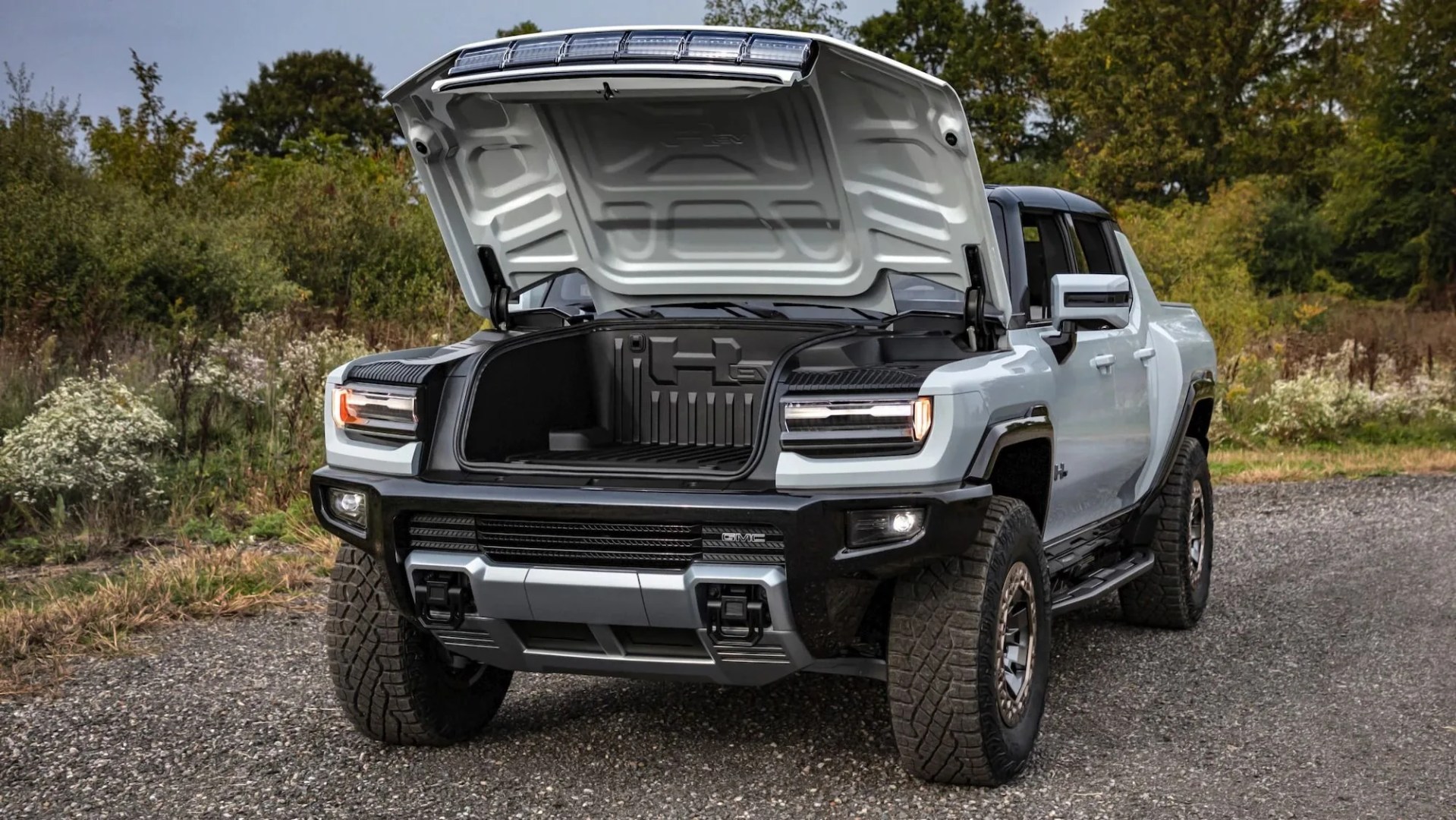 an electric hummer with the hood raised