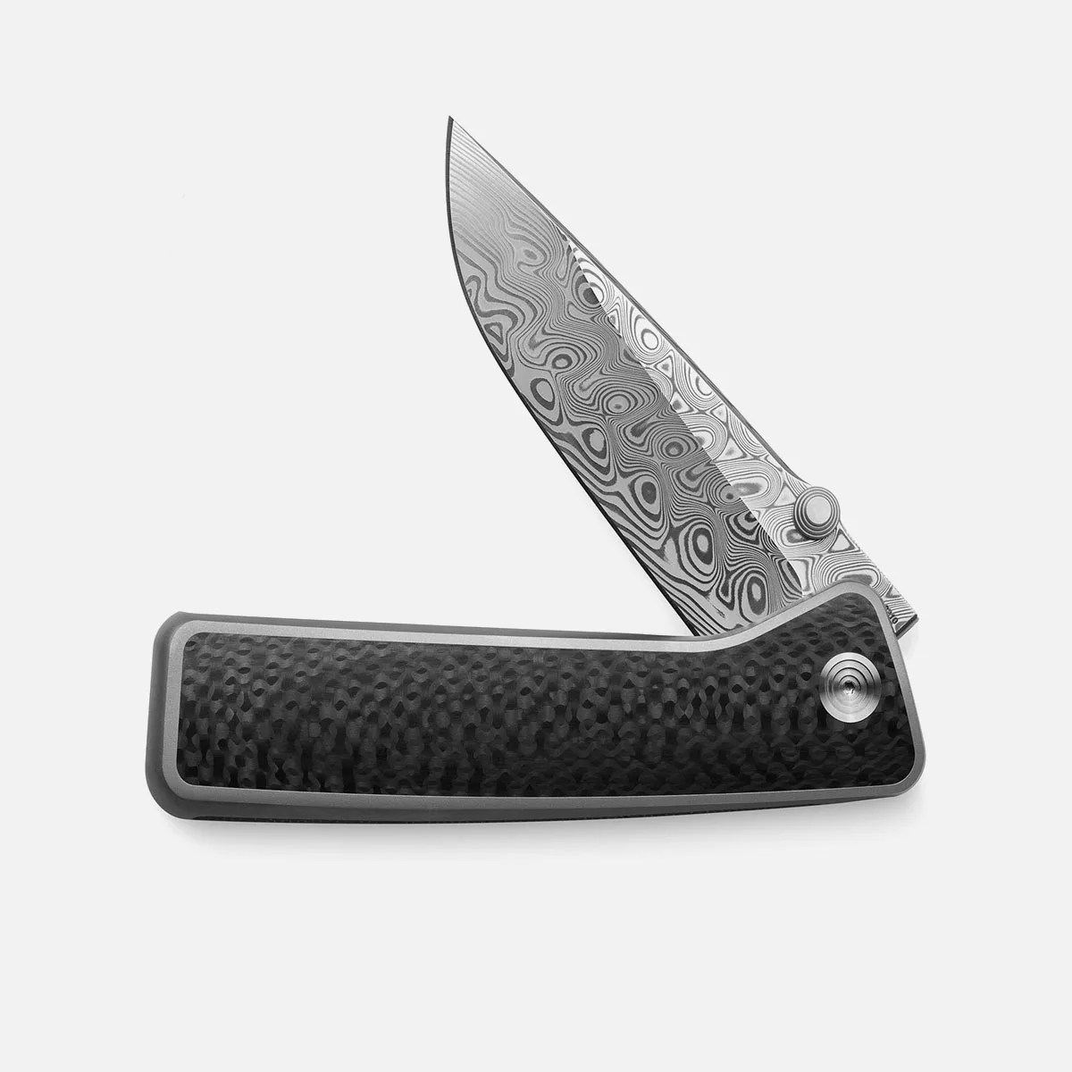 The James Brand The Barnes Knife in Carbon Fiber opened half way on a white background