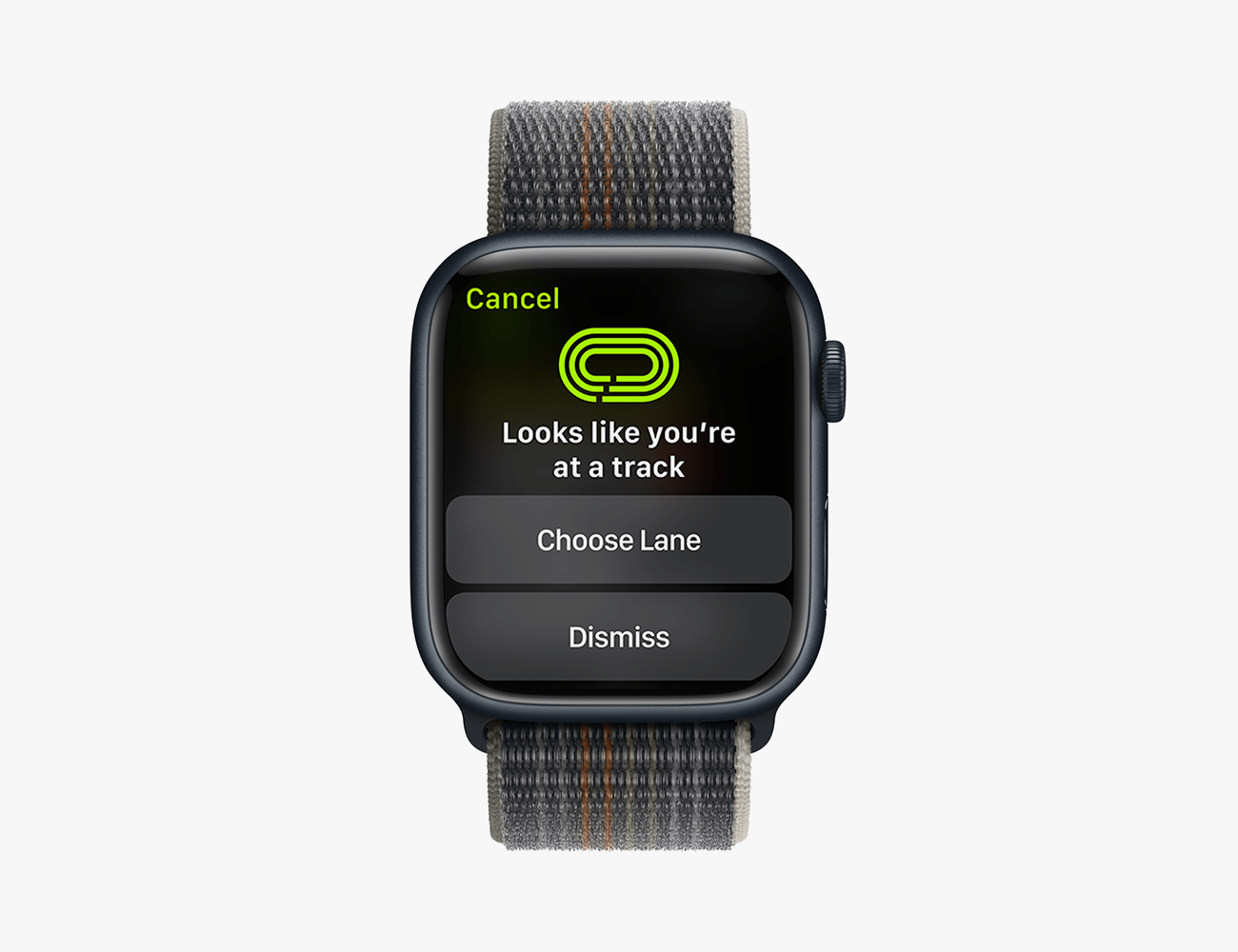an apple watch ultra with a grey strap displaying a track app on its screen