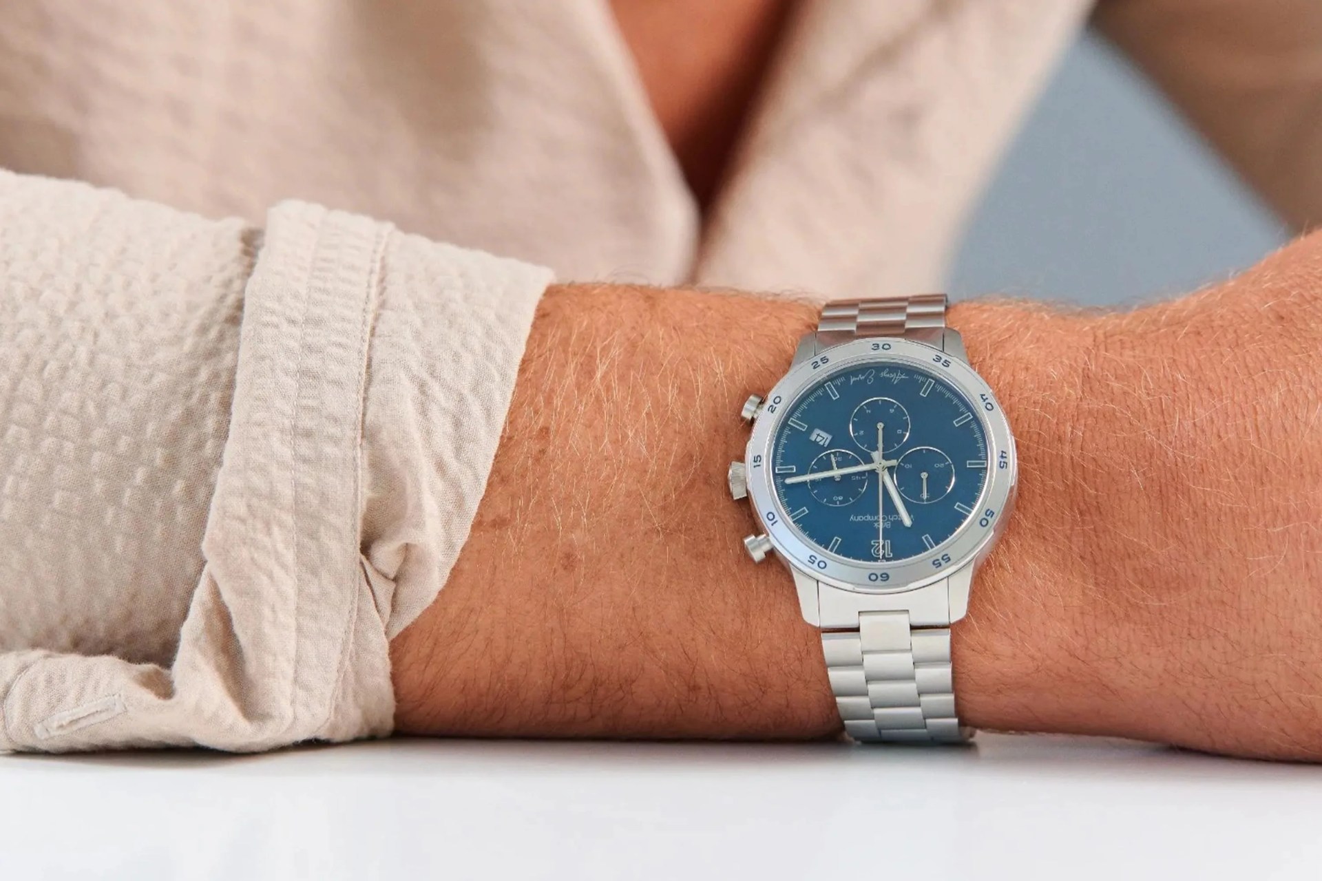 brick watch on a mans wrist