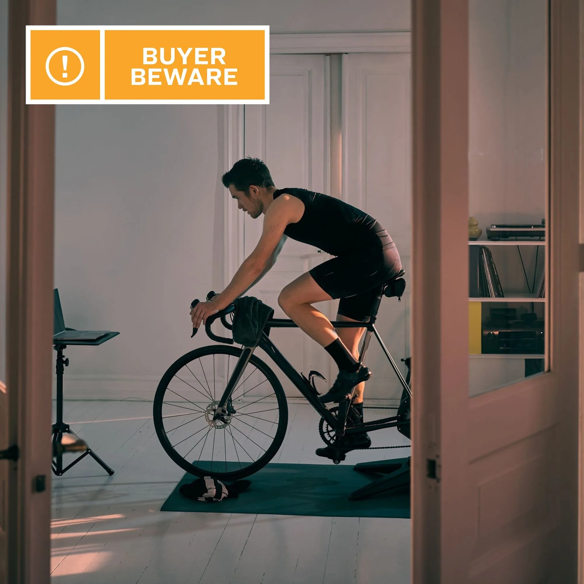 man riding an indoor bike