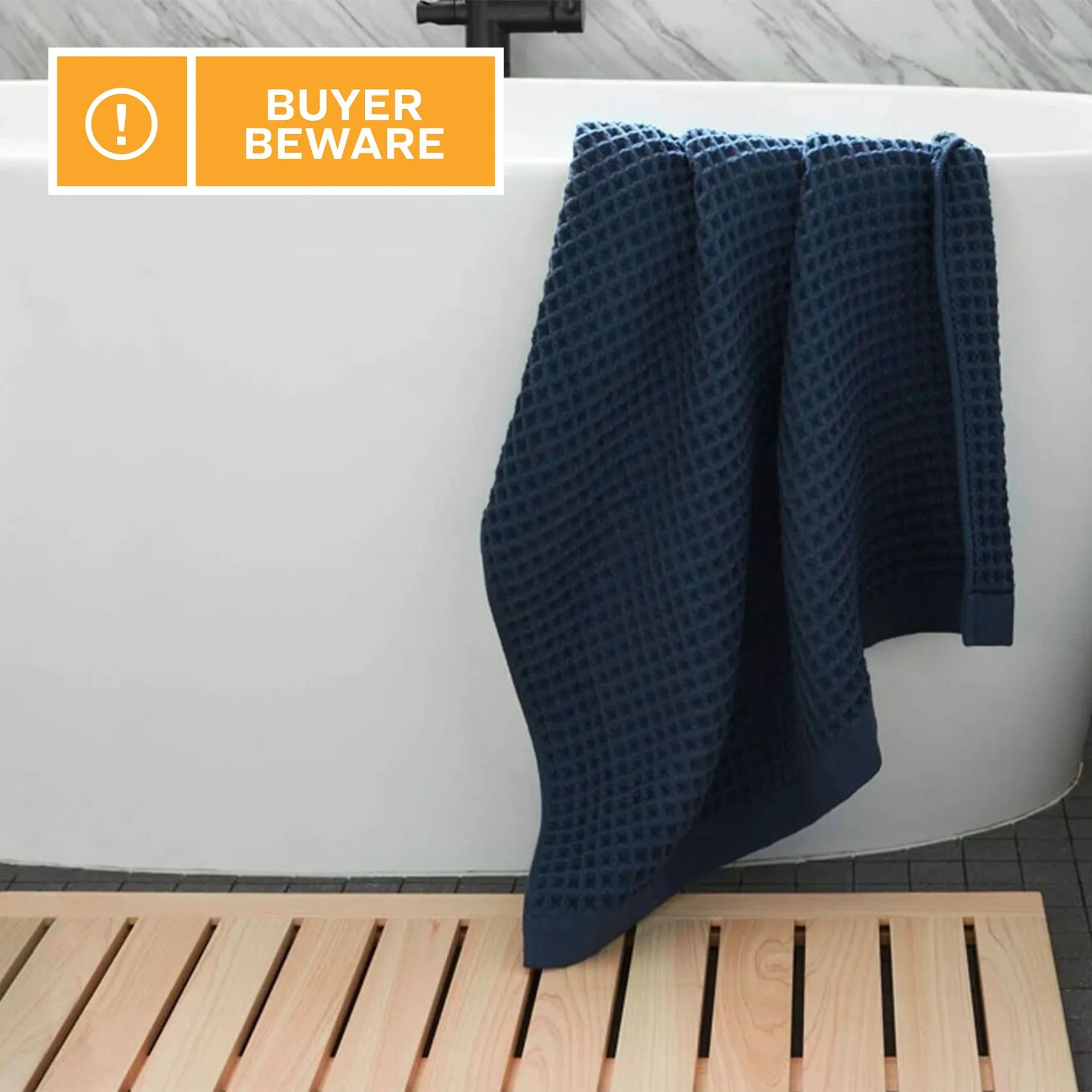 a towel draped over a tub