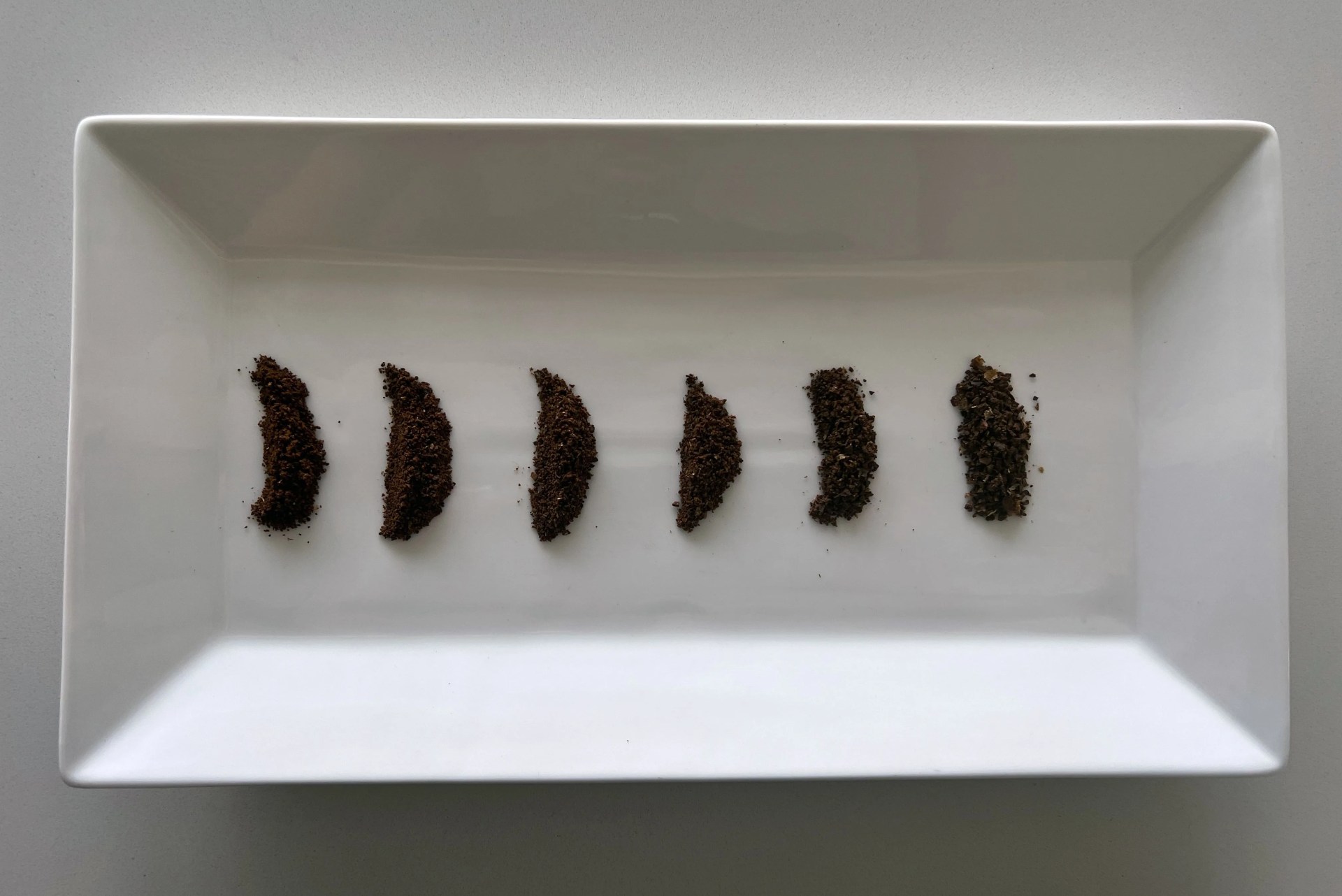 piles of coffee grounds on a plate