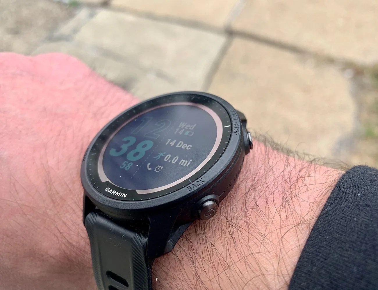 a black garmin forerunner 955 on editor ben emminger's wrist
