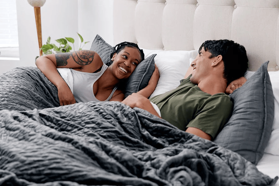 couple with weighted blanket