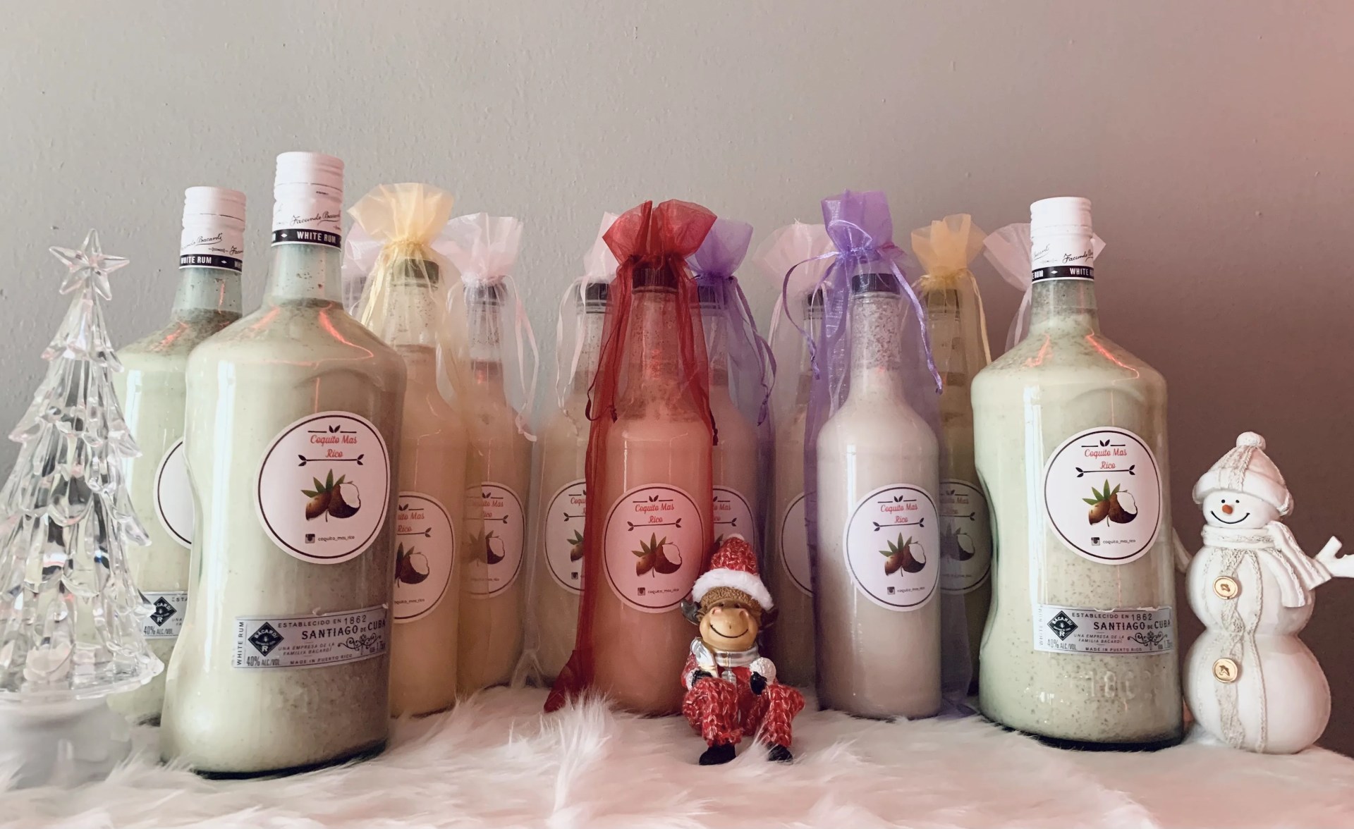 bottles of coquito on a christmas shelf