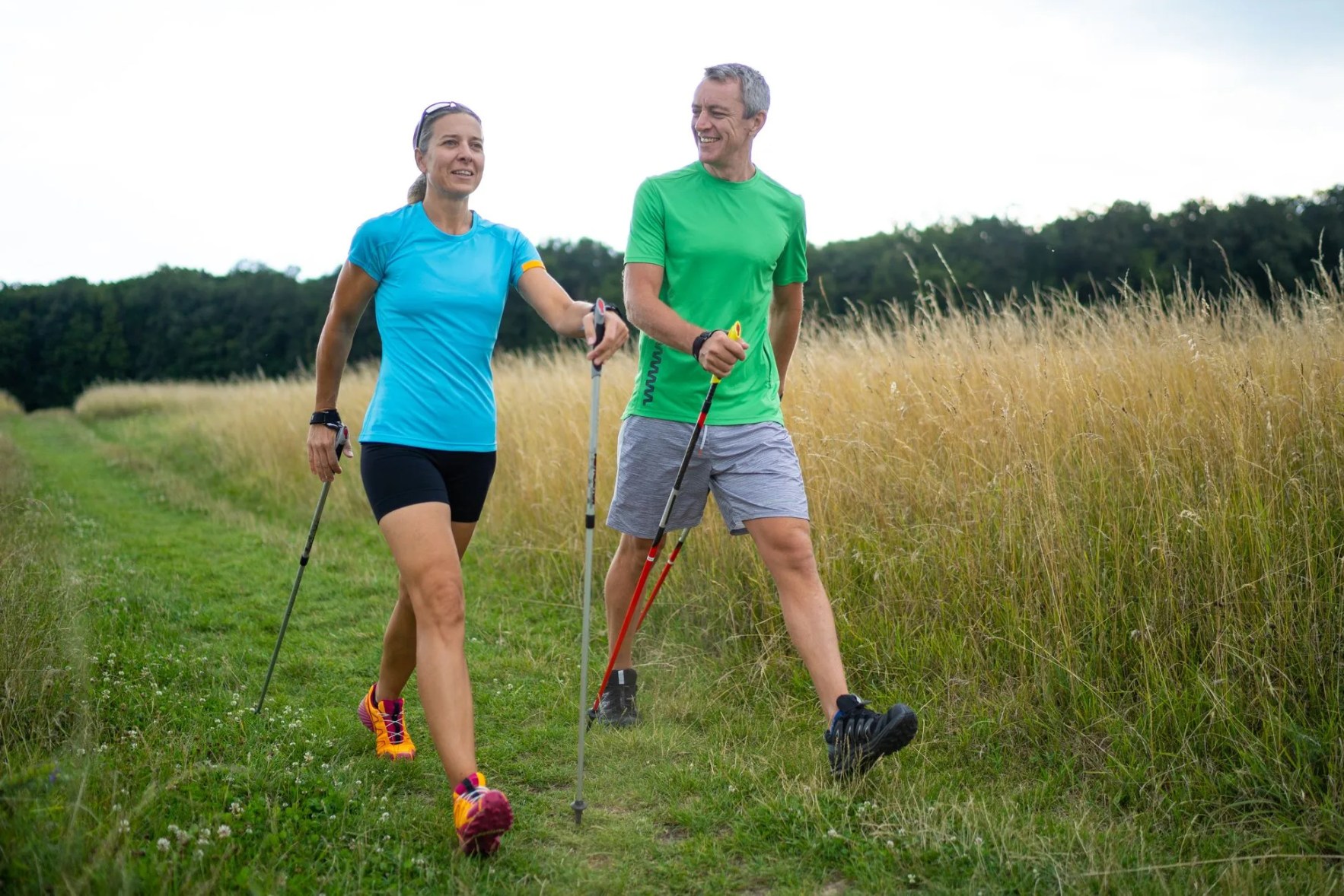 personal nordic walking instructor with female customer
