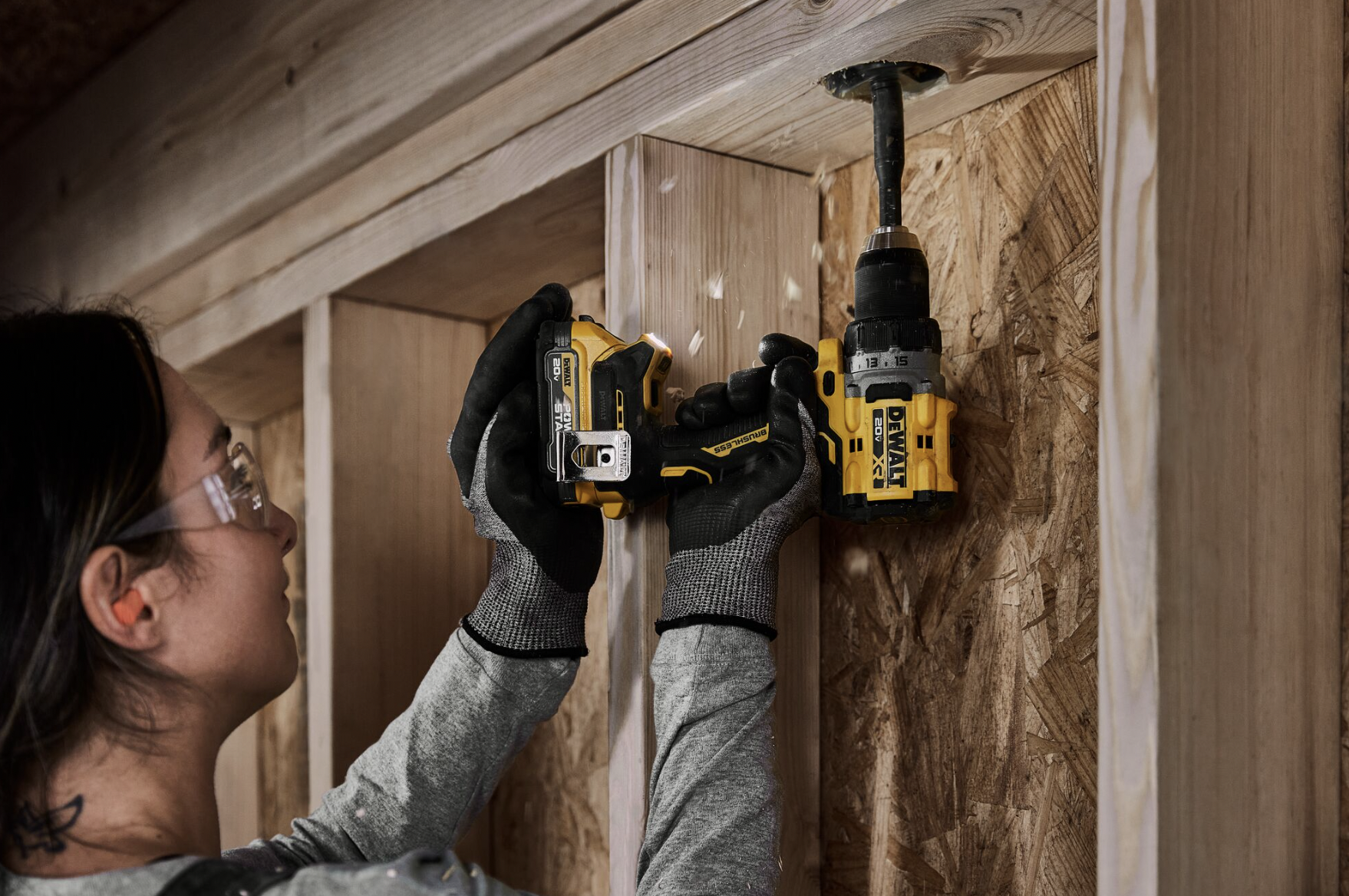 person using power drill
