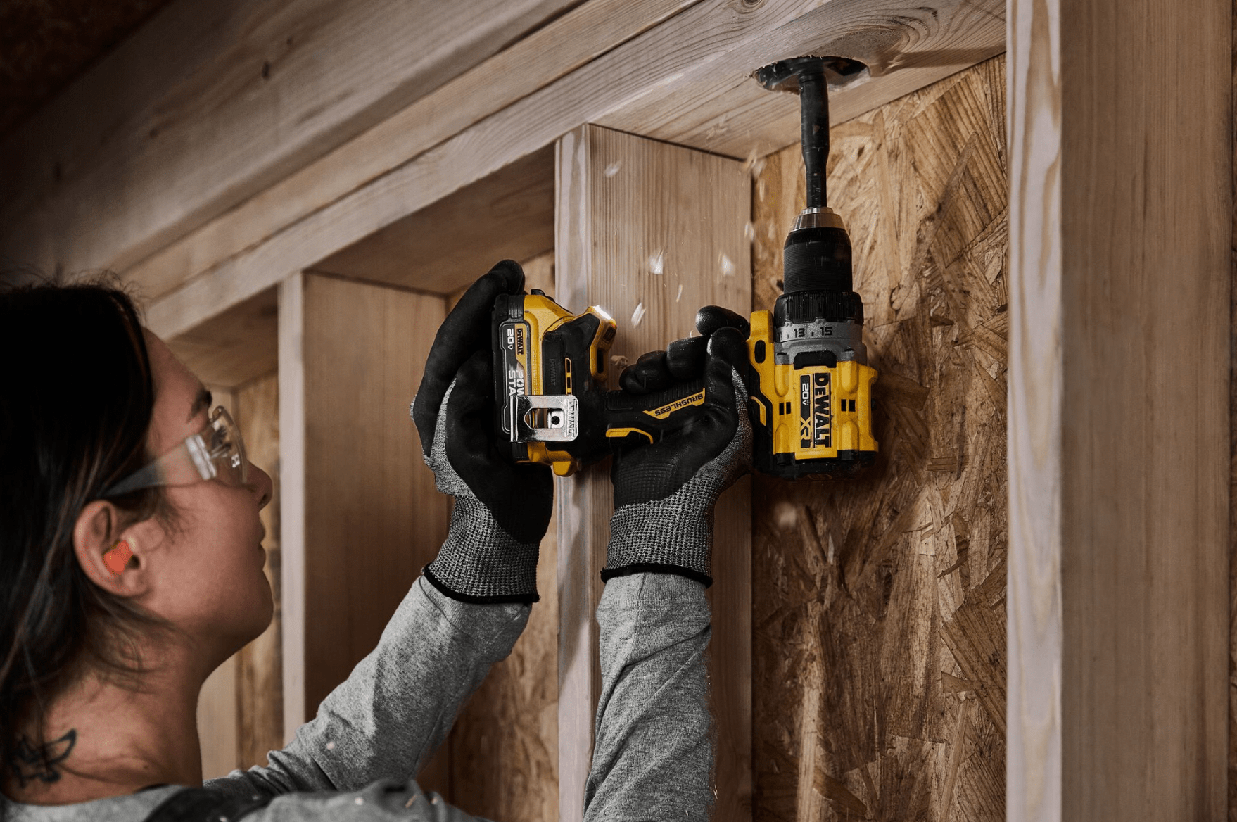 person using power drill