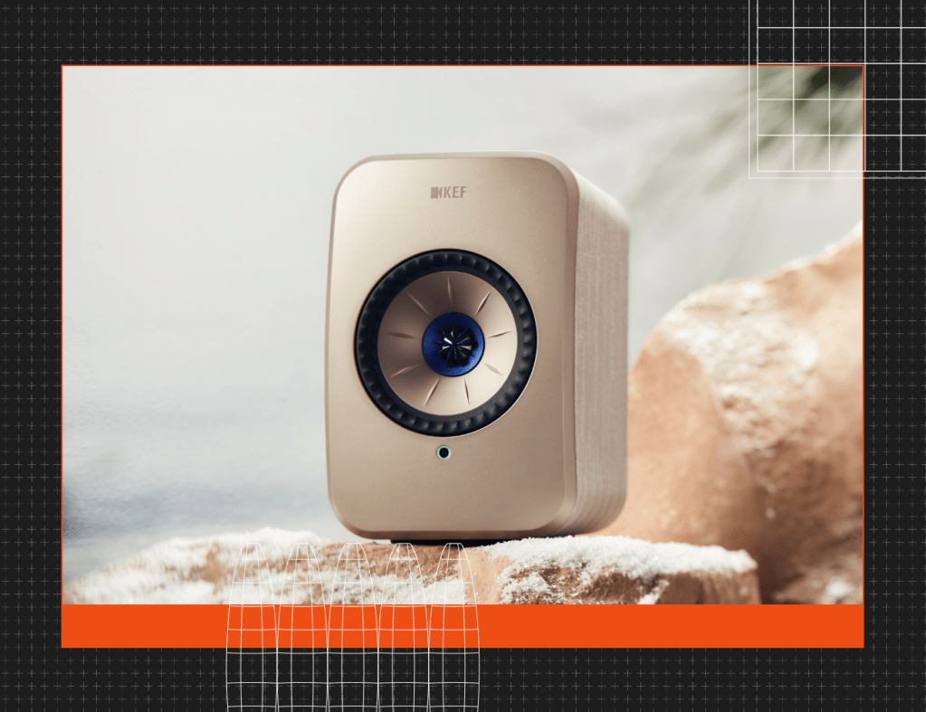 kef speaker on snowy rocks