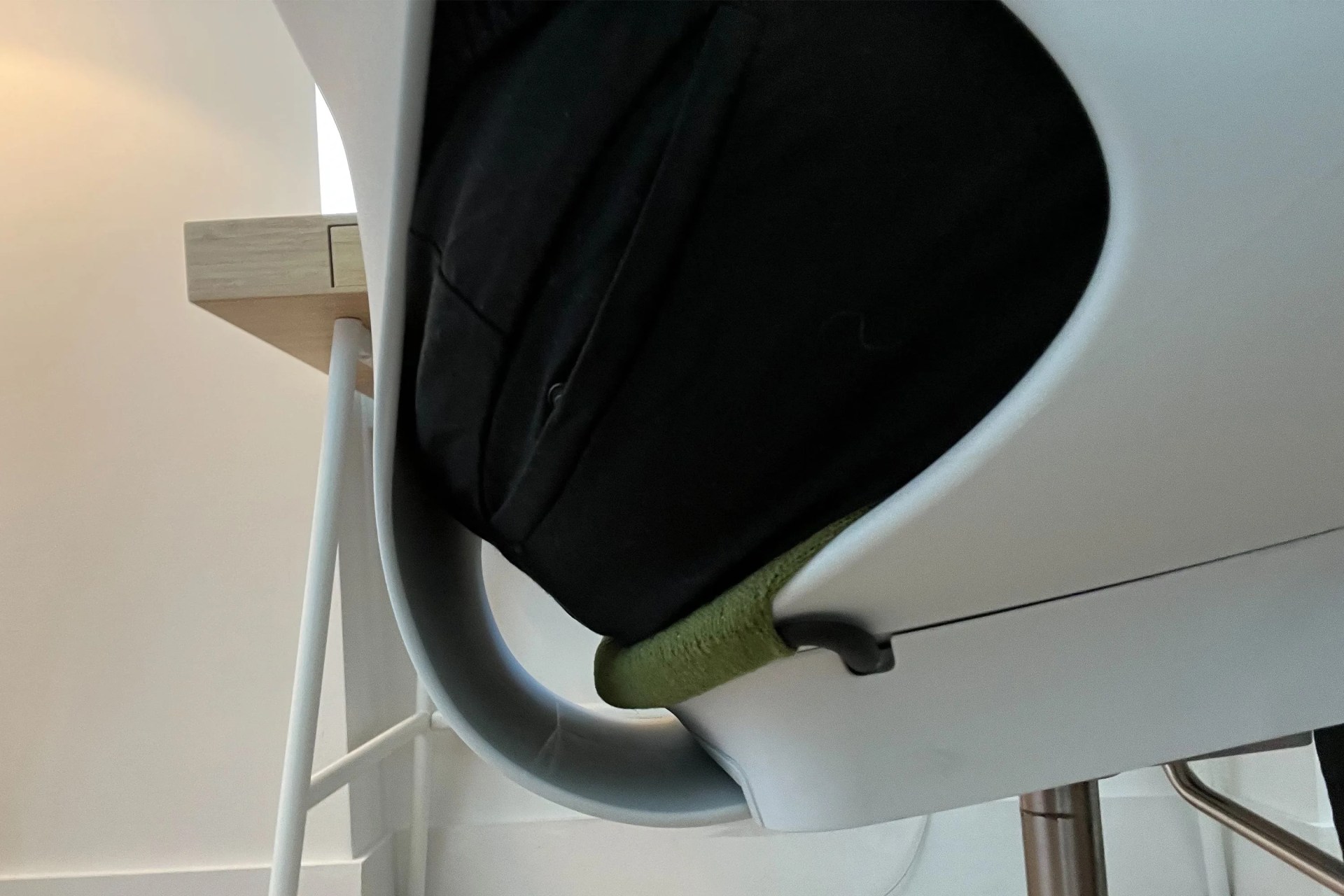 someone sitting in a zeph multipurpose armchair