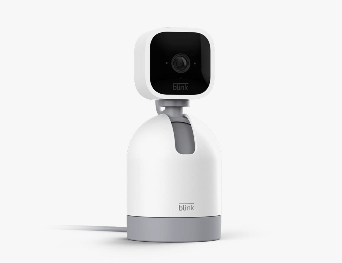 a home security camera with black top and white and grey base