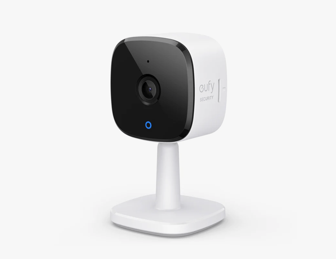 a home security camera with black top and white base