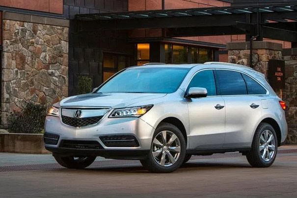 acura mdx parked in front of a modern house