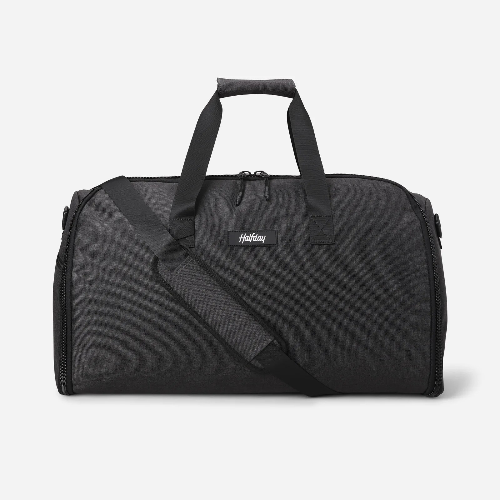 Halfday Garment Duffel in grey against a light grey background